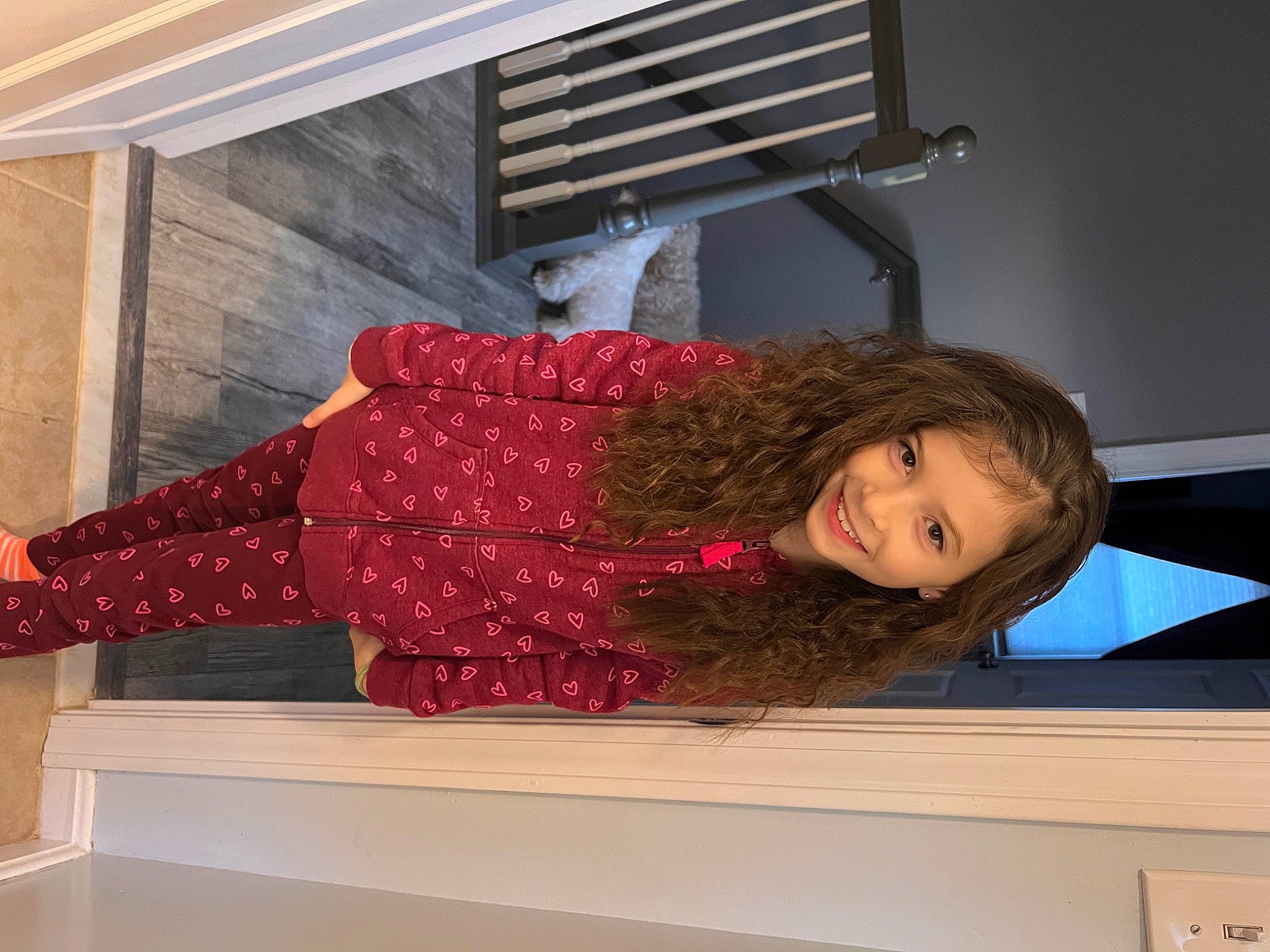 Chanel is registered to the contest to win money with this photo: cleanliness, comfort, composite_material, elbow, electric_blue, fashion_design, flooring, human_leg, joy, knee, magenta, pattern, person, rectangle, room, sleeve, thigh, waist, wood