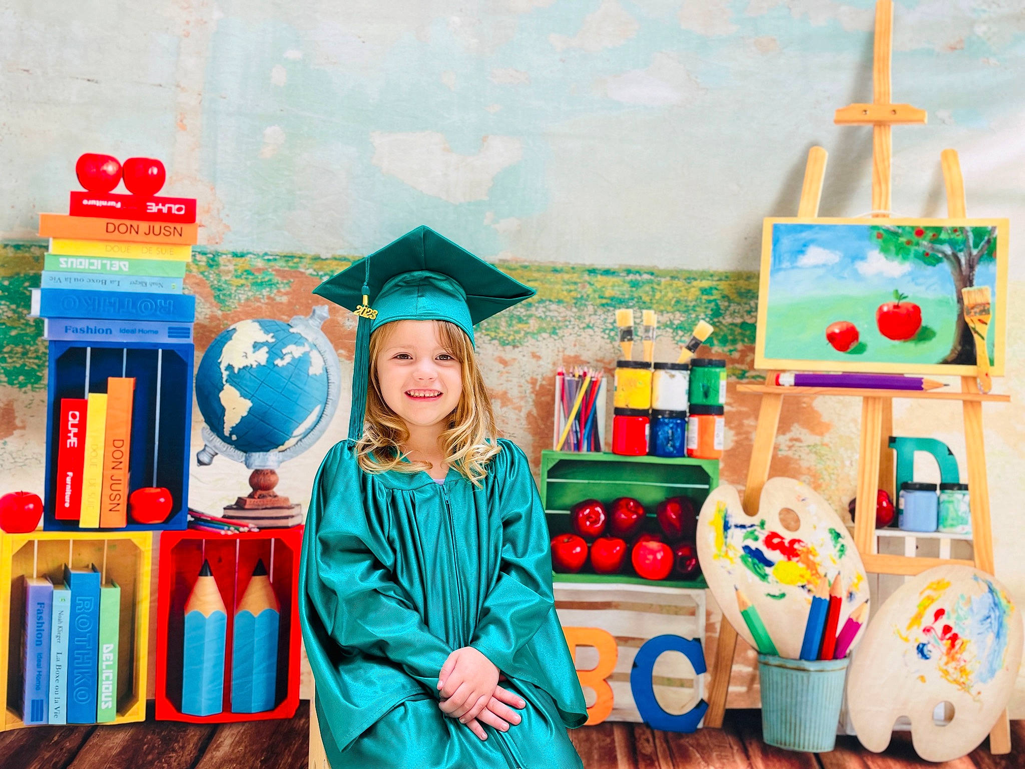 Ava joined the competition — help win amazing prizes! academic_dress, academic_institution, blue, chair, child, event, fun, happy, hat, headwear, joy, leisure, magenta, mortarboard, person, photograph, play, recreation, room, smile