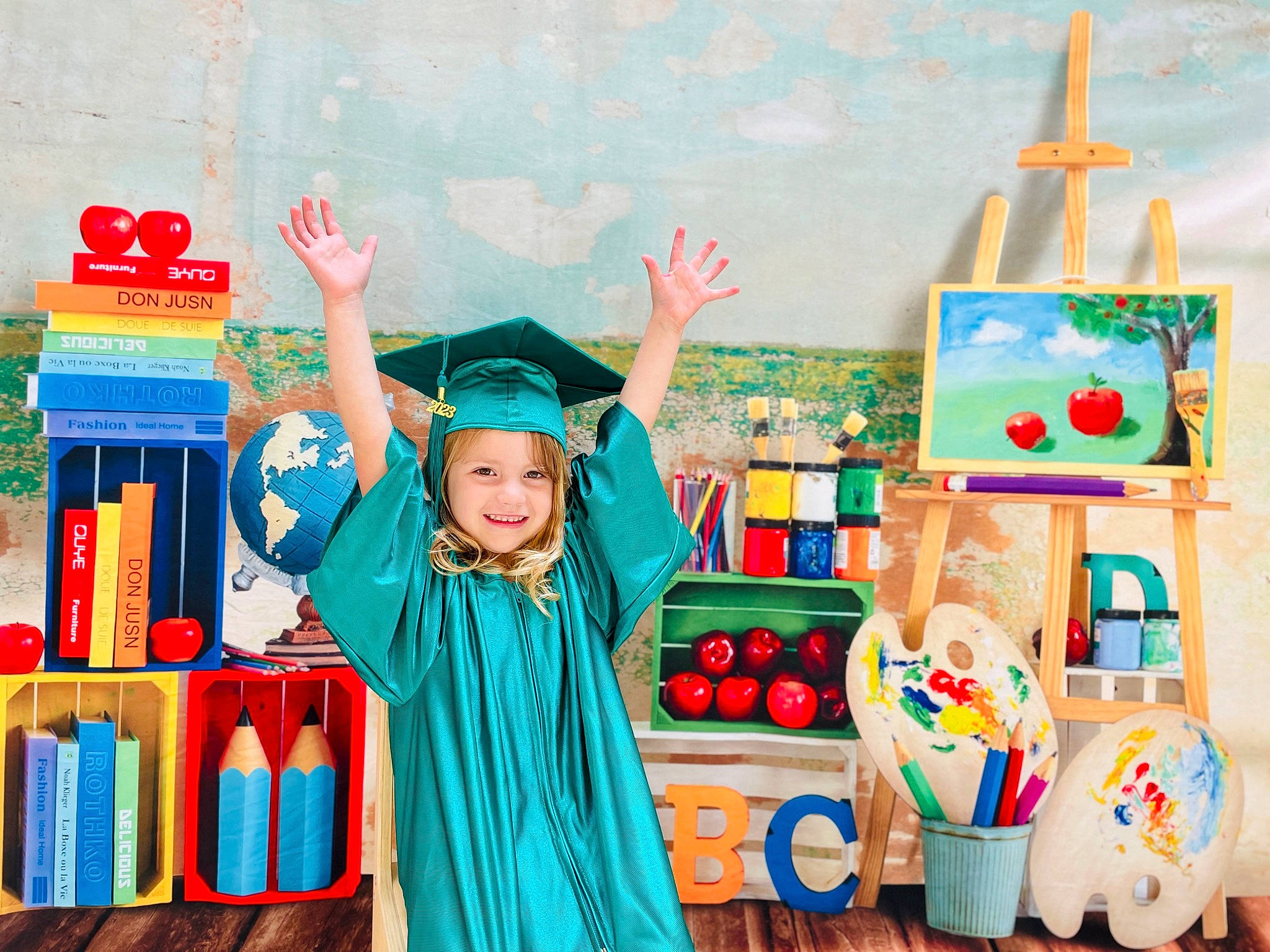 Ava is registered to the contest to win money with this photo: academic_institution, art, blue, bookcase, child, class, event, fun, happy, hat, headwear, joy, kindergarten, leisure, party_supply, person, play, room, shelf, teacher
