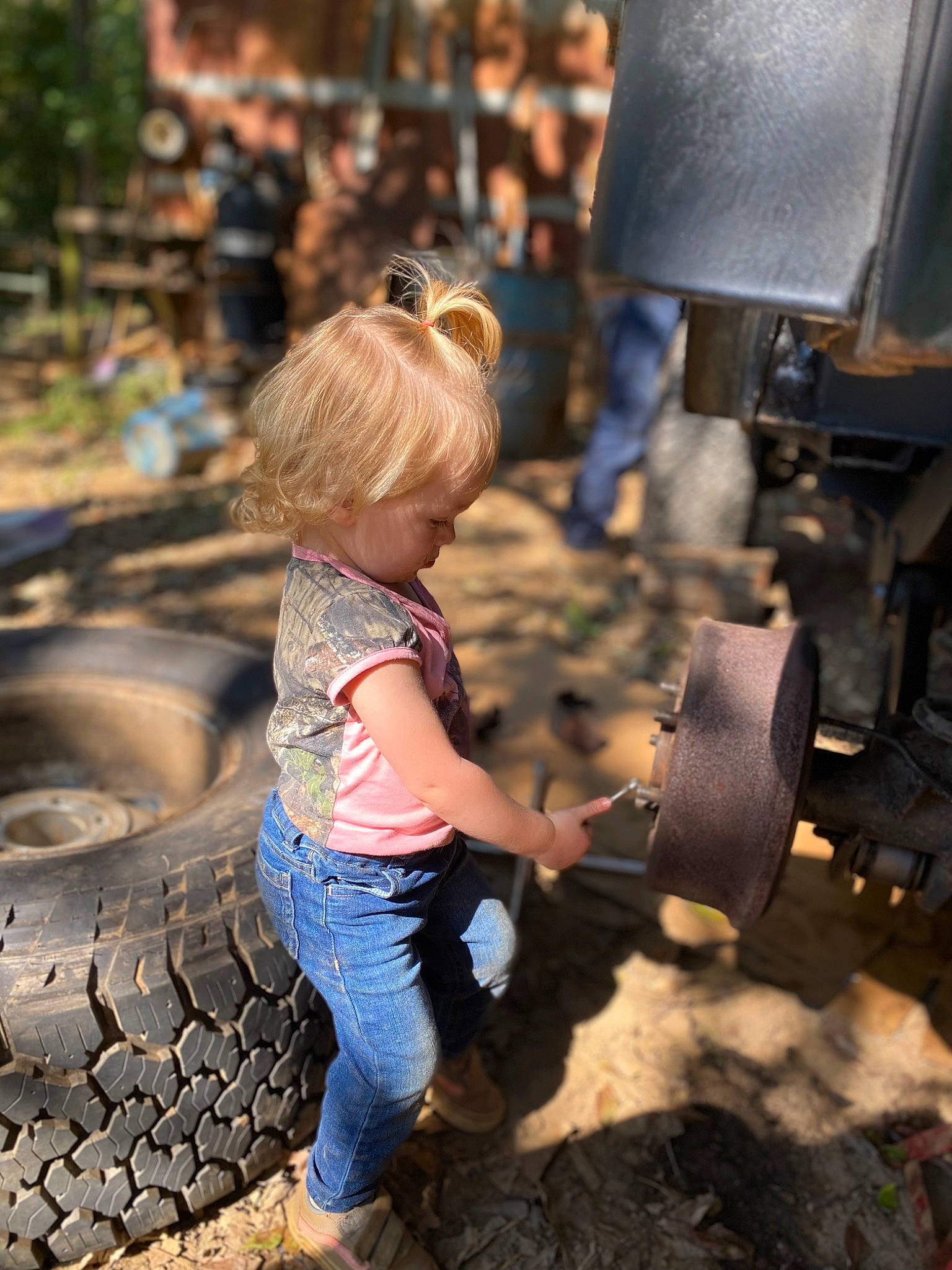 Aryanna joined the competition — help win amazing prizes! asphalt, auto_part, automotive_exterior, automotive_tire, automotive_wheel_system, fun, grass, happy, human_leg, leisure, light, motor_vehicle, person, public_space, soil, t_shirt, tire, toddler, tread, wheel