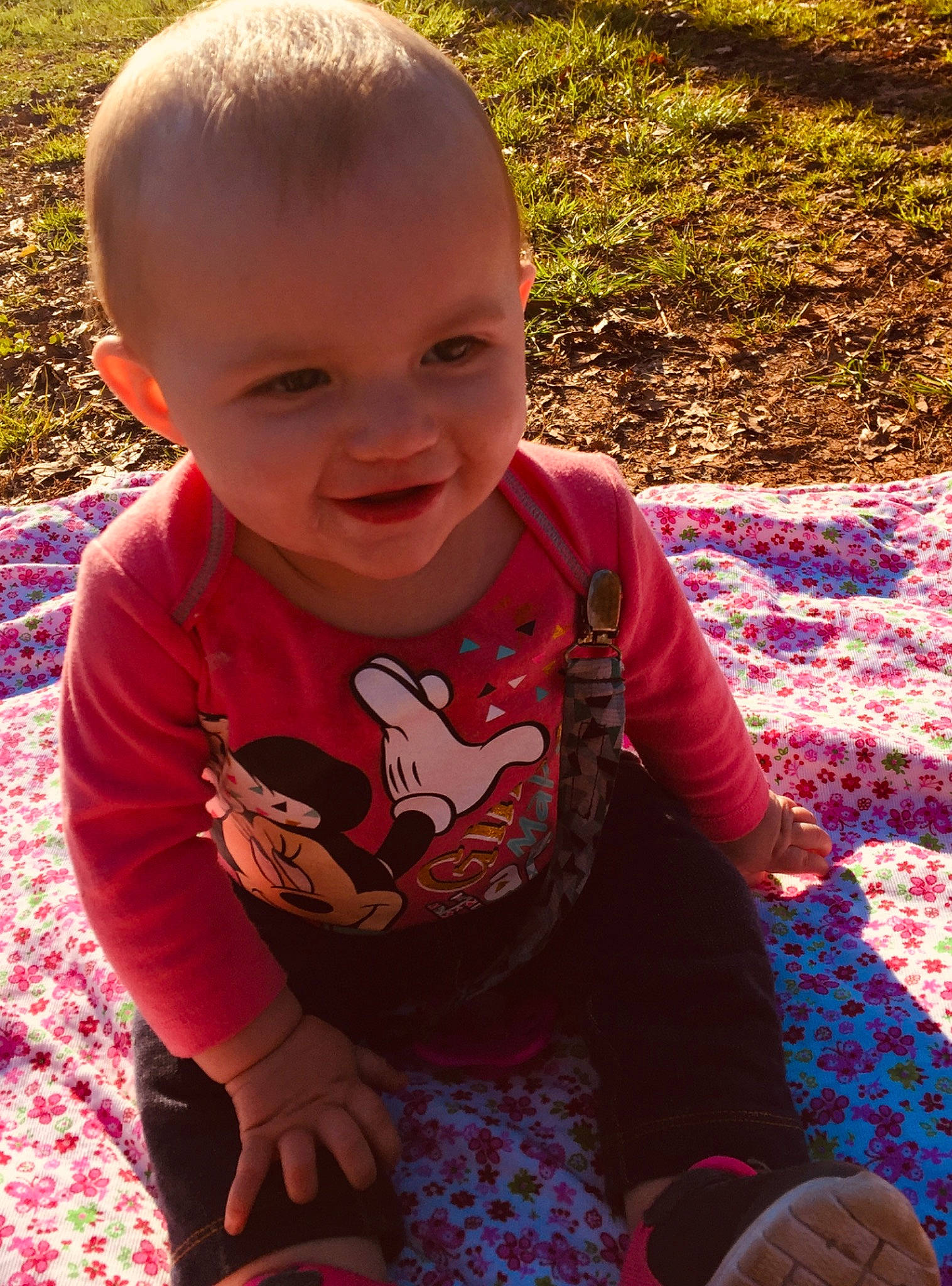 Ava Graclyn is registered to the contest to win money with this photo: baby, cheek, child, design, eye, face, facial_expression, fun, grass, head, leaf, pattern, people, person, pink, play, sitting, skin, smile, summer