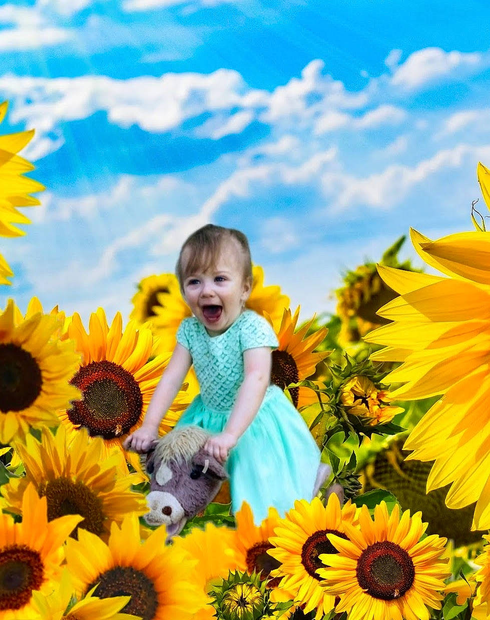 Nadia is registered to the contest to win money with this photo: adaptation, cloud, daytime, facial_expression, flower, flowering_plant, grass, happy, leaf, meadow, morning, natural_environment, people_in_nature, person, petal, plant, sky, summer, sunflower, toddler