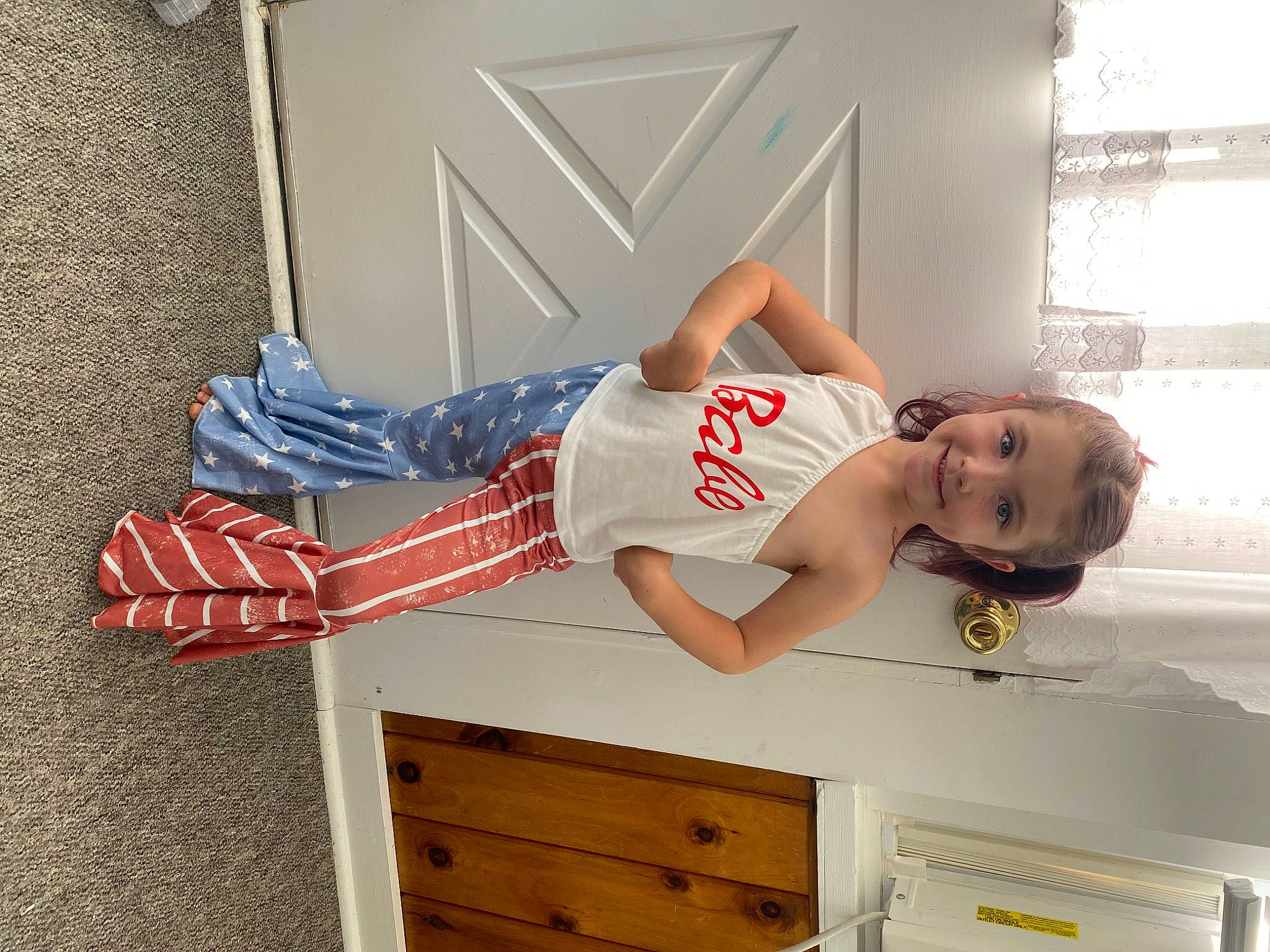 Clarity is registered to the contest to win money with this photo: automotive_design, cabinetry, chest_of_drawers, drawer, dress, dresser, elbow, fashion_design, happy, human_leg, joy, knee, person, shorts, smile, sportswear, thigh, tire, trunk, waist