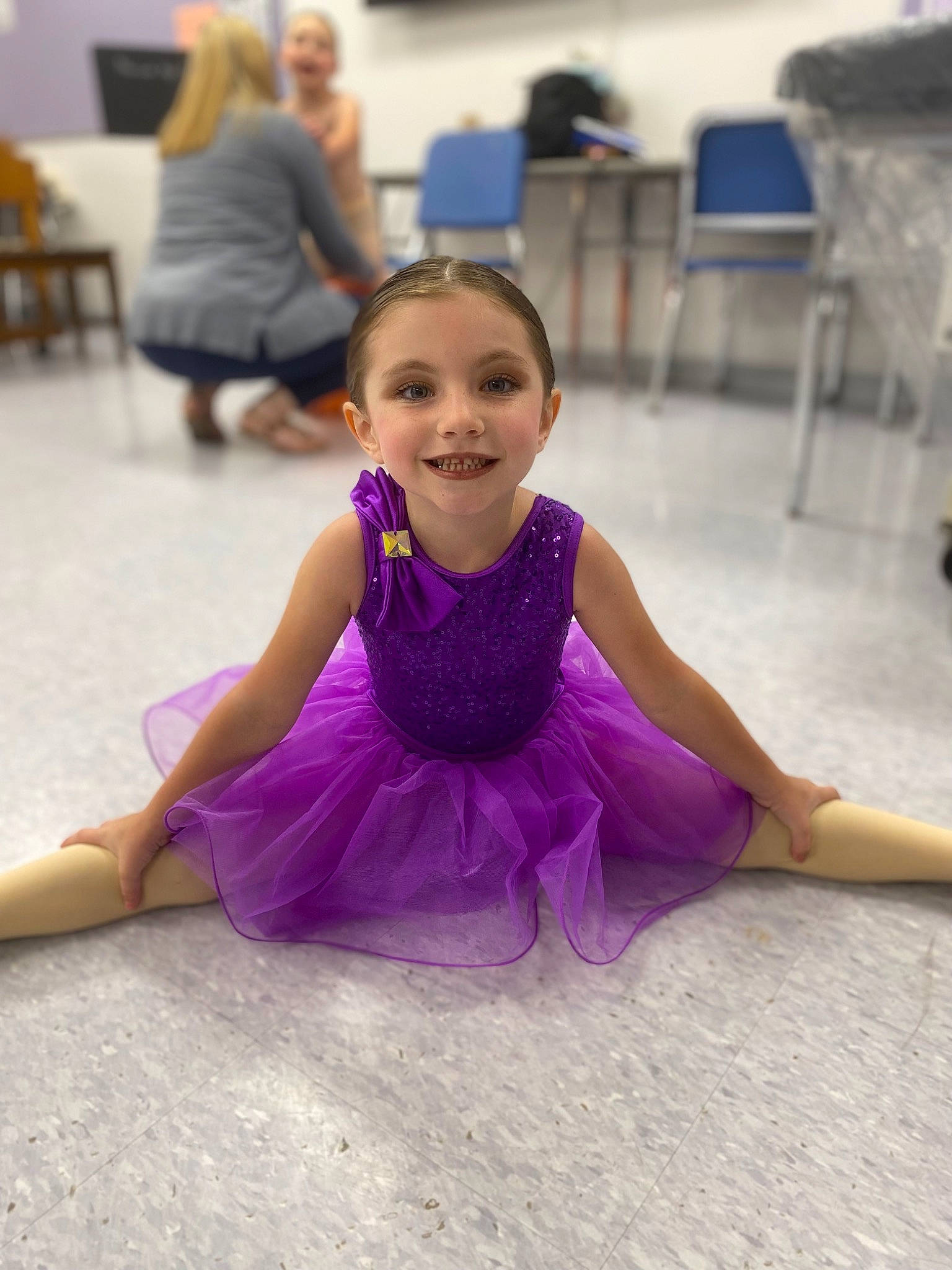 Clarity is registered to the contest to win money with this photo: blurred, chair, dance, electric_blue, entertainment, event, flooring, fun, furniture, happy, joint, joy, leg, leisure, magenta, performing_arts, person, purple, smile, sportswear