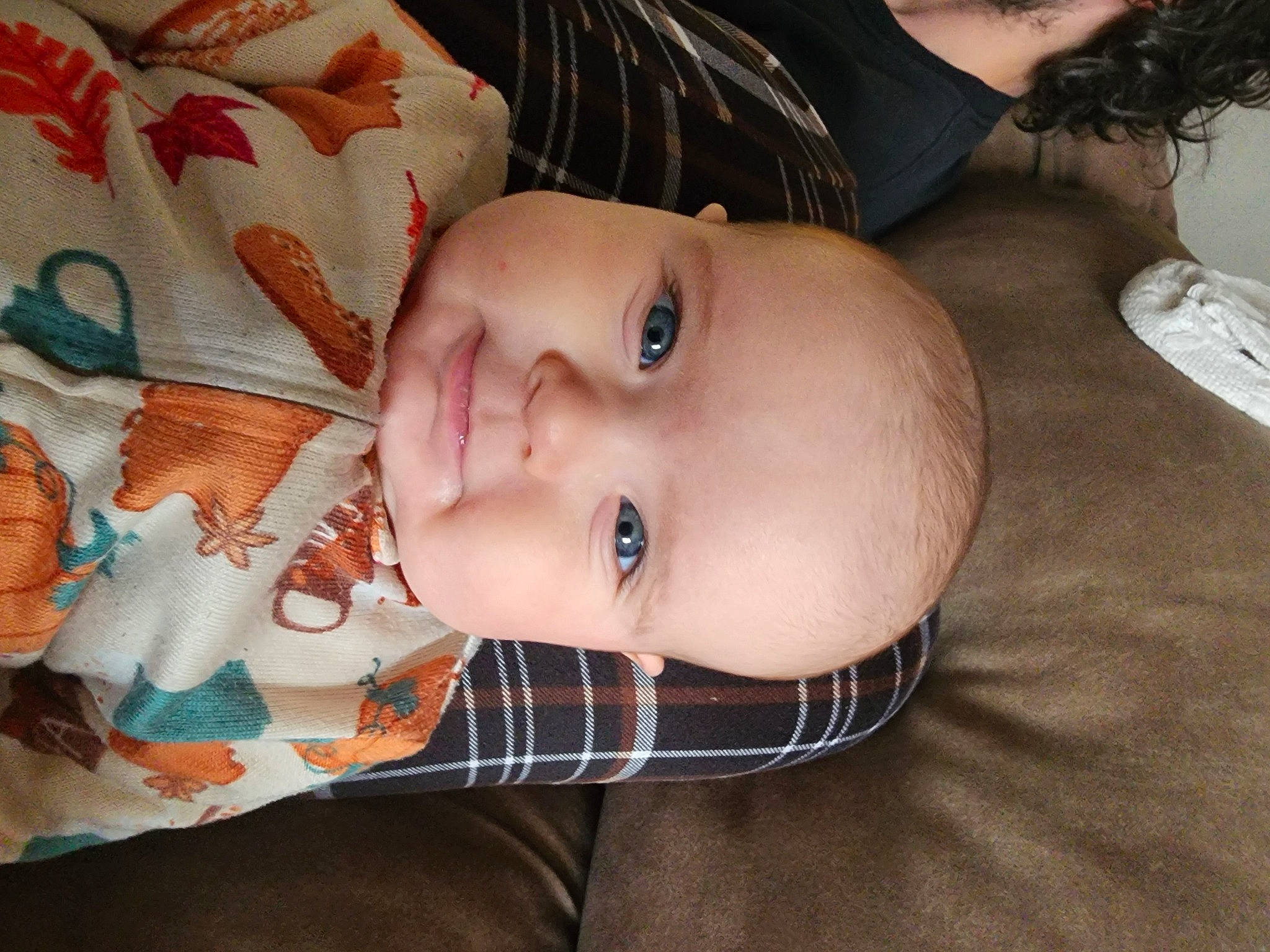 Olivia is registered to the contest to win money with this photo: baby, baby_products, baby_toddler_clothing, cheek, child, comfort, eyelash, iris, linens, lip, nose, pattern, person, skin, smile, textile, toddler