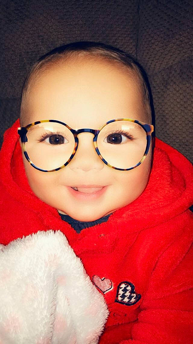 Javani is registered to the contest to win money with this photo: cheek, child, chin, cool, eyebrow, eyewear, face, forehead, glasses, head, lip, mouth, nose, person, red, smile, vision_care