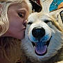 Aspen Waya is registered to the contest to win money with this photo: woman, dog, kiss, happy, smiling, tongue_out, fluffy_dog, indoor, close_up, affection, blonde_hair, pet, face, joy, love, cozy, home, portrait, cute, animal