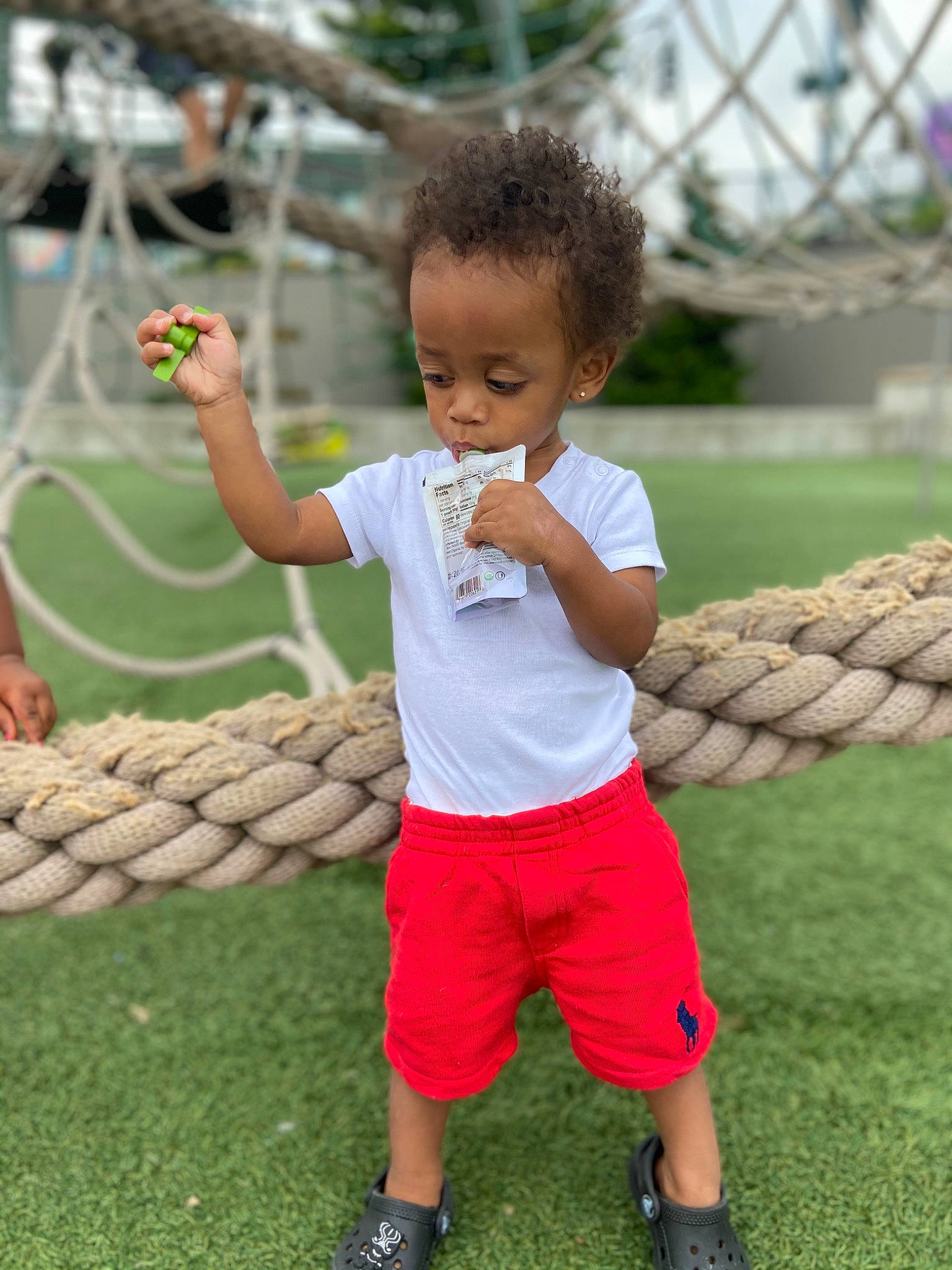 Nasir is registered to the contest to win money with this photo: arm, child, competition_event, finger, fun, grass, happy, human_leg, leg, leisure, people_in_nature, person, play, player, recreation, shorts, spring, t_shirt, thumb, toddler