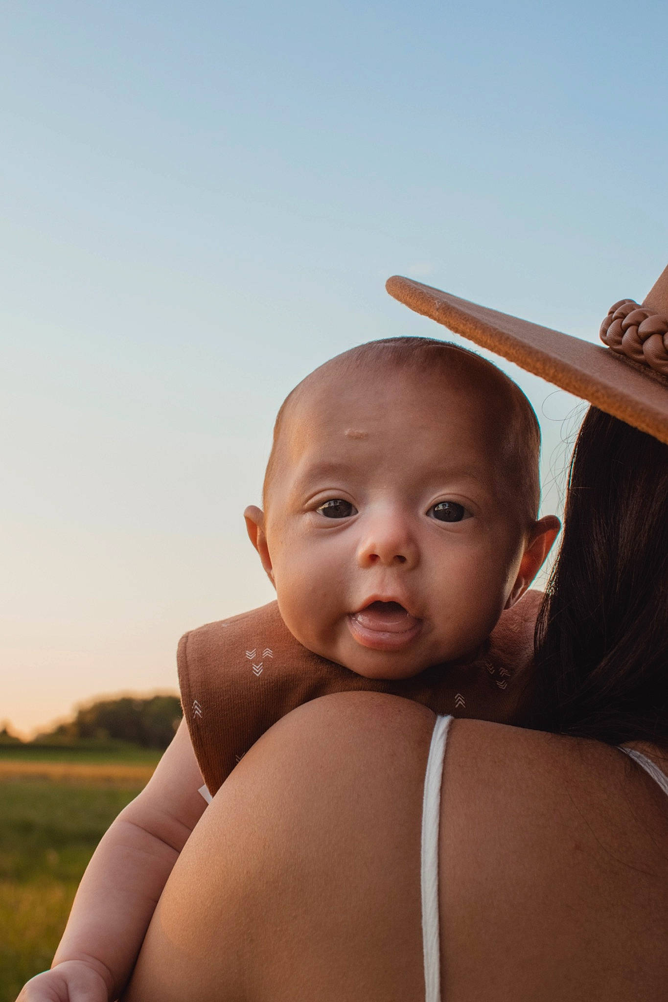Maddux joined the competition — help win amazing prizes! arm, chin, elbow, eye, finger, flash_photography, gesture, hairstyle, hand, happy, human_body, lip, neck, person, shoulder, skin, sky, standing, sunlight, toddler