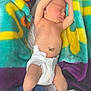 Aiden joined the competition — help win amazing prizes! baby, newborn, sleeping, diaper, blanket, colorful, fuzzy, infant, arms_up, peaceful, cute, bed, soft, pattern, moon, stars, skin, face, resting, lying_down