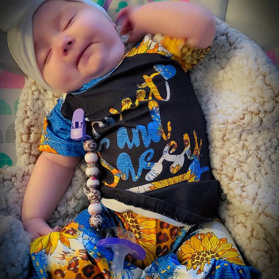 Stormie joined the competition — help win amazing prizes! accessories, baby, bed, blanket, bonnet, cap, clothing, couch, face, furniture, hat, head, jewelry, necklace, newborn, person, photography, portrait, shorts, sleeping