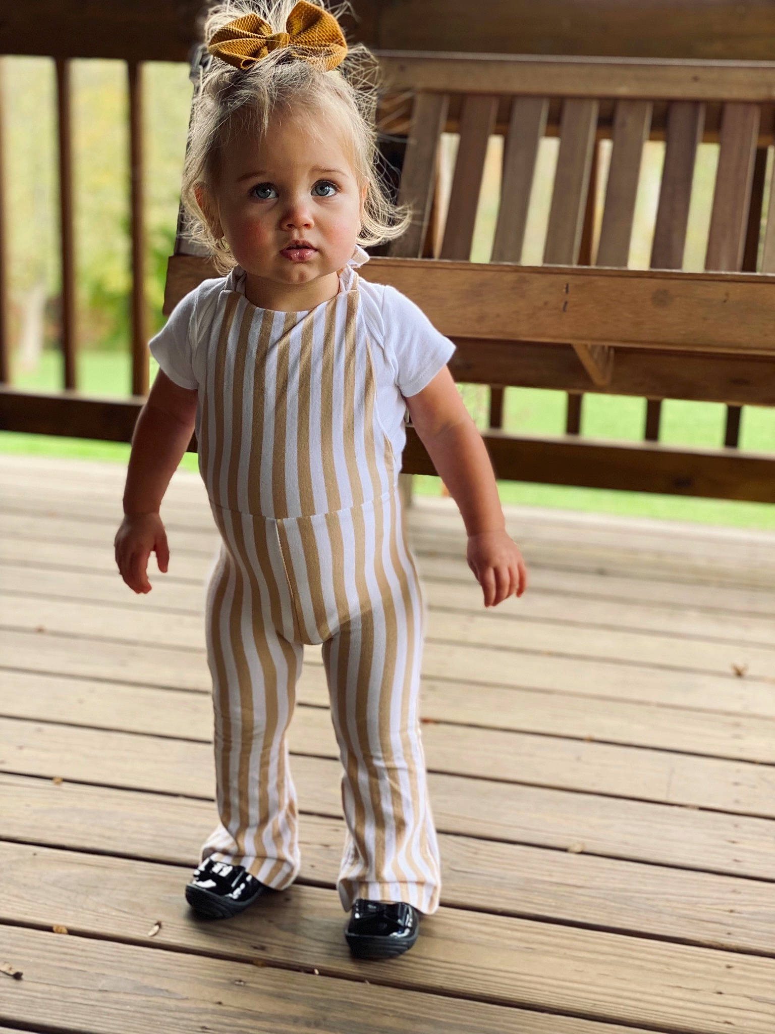 Bexley joined the competition — help win amazing prizes! baby_toddler_clothing, child, dress, eye, face, flooring, foot, fun, gesture, hand, happy, leg, pattern, people_in_nature, person, skin, sleeve, standing, toddler, waist