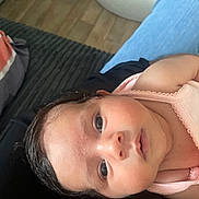 Sofia a rejoint le concours — aidez-le/la à gagner de superbes lots ! baby, infant, face, skin, clothing, pink, person, portrait, cute, newborn, looking, indoors, babywear, soft, child, head, eyes, expression, lying, floor