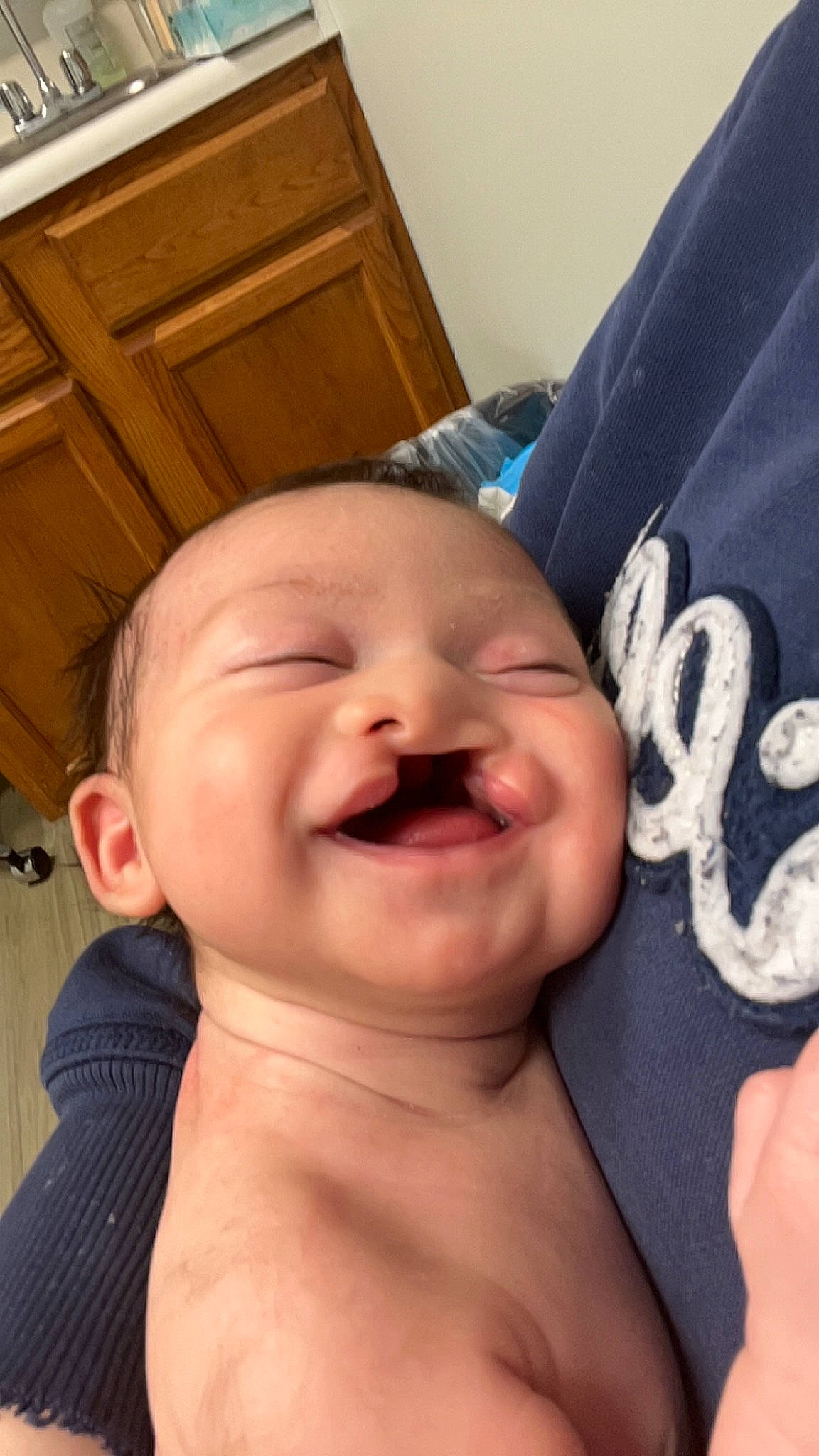 Lilith joined the competition — help win amazing prizes! baby, baby_laughing, cabinetry, cheek, chin, eyebrow, eyelash, finger, forehead, gesture, happy, jaw, lip, mouth, neck, nose, person, skin, smile, toddler