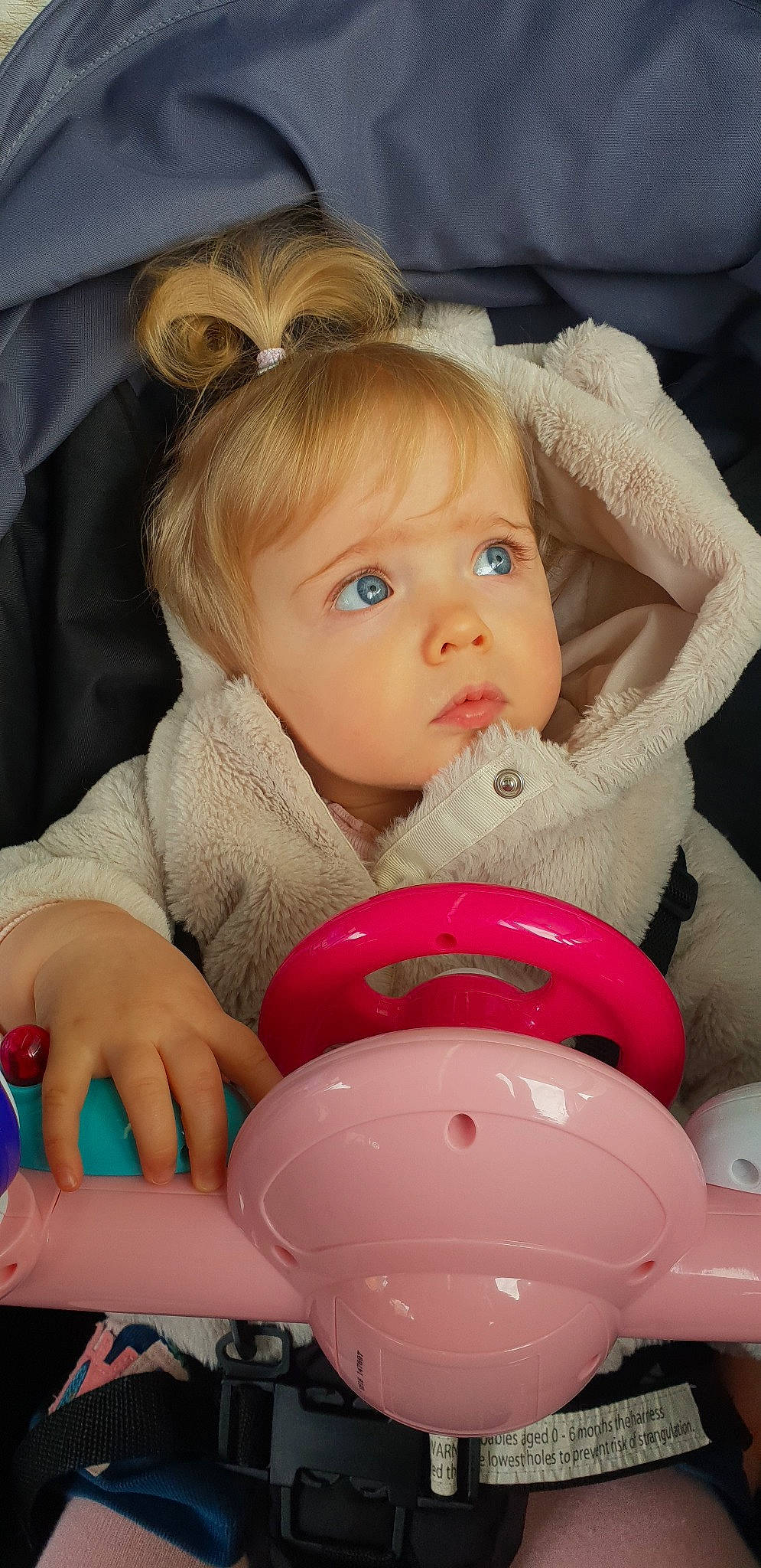 Lilly-may is registered to the contest to win money with this photo: baby, baby_products, cheek, child, eye, iris, mouth, person, pink, play, product, sitting, skin, toddler