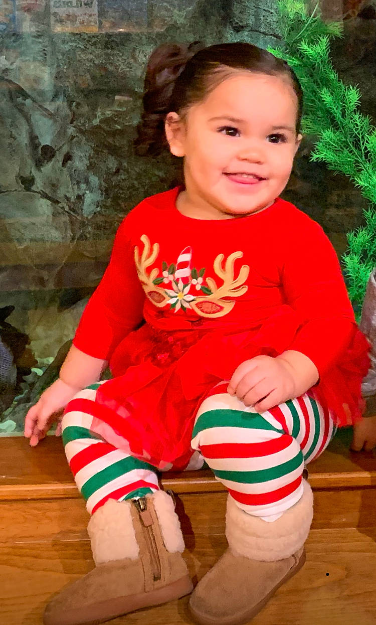 Yesenia joined the competition — help win amazing prizes! baby, baby_toddler_clothing, child, child_model, christmas, christmas_eve, holiday, joy, person, sitting, sleeve, smile, toddler