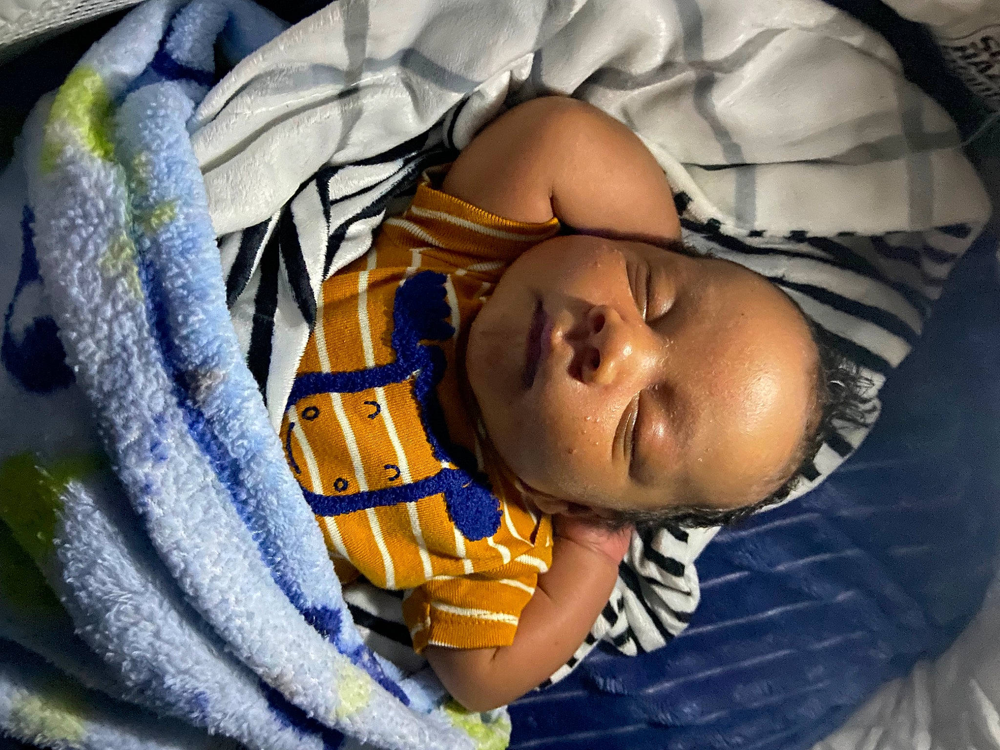 Jaxston joined the competition — help win amazing prizes! arm, baby, baby_products, baby_sleeping, baby_toddler_clothing, bedtime, cheek, child, comfort, eye, happy, human_body, linens, mouth, nap, person, room, sitting, skin, textile