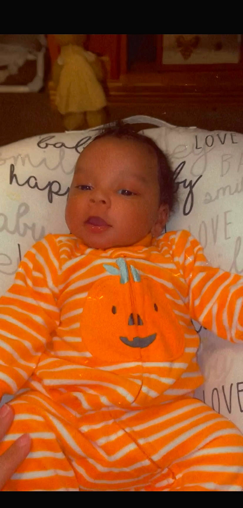 Jaxston is registered to the contest to win money with this photo: baby, baby_toddler_clothing, cheek, chin, eye, eyebrow, face, facial_expression, forehead, hairstyle, head, human, mouth, nose, orange, person, skin, sleeve, t_shirt, textile