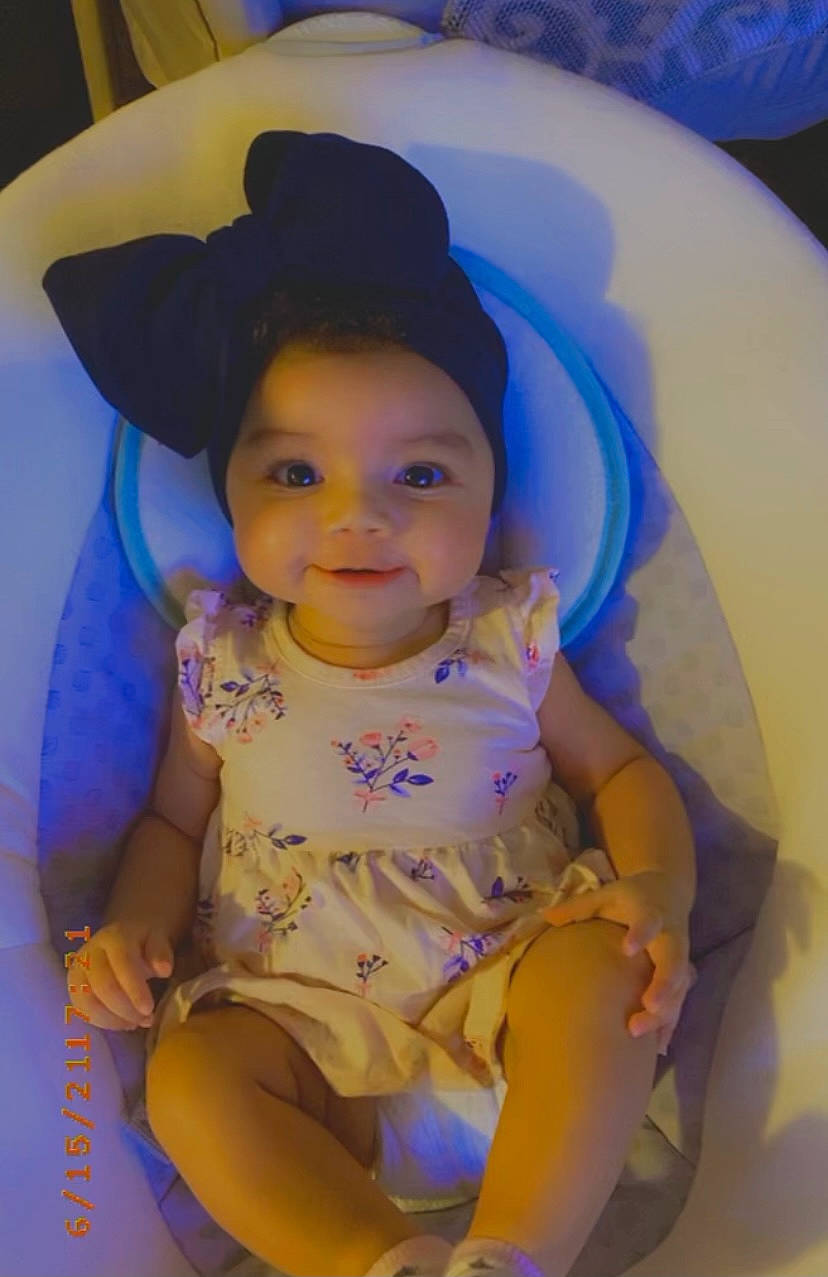 Sage is registered to the contest to win money with this photo: baby, blue, child, cool, facial_expression, fun, hair, hairstyle, happy, hat, headgear, iris, joy, leisure, mouth, person, pink, purple, skin, smile