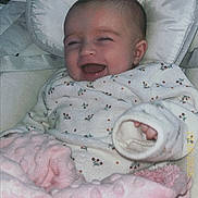 Cataleyah participe au concours pour gagner de l'argent avec cette photo : baby, infant, smiling, laughing, blanket, pajamas, pink, white, face, head, person, child, cozy, cushion, seat, cute, happy, indoor, newborn, soft