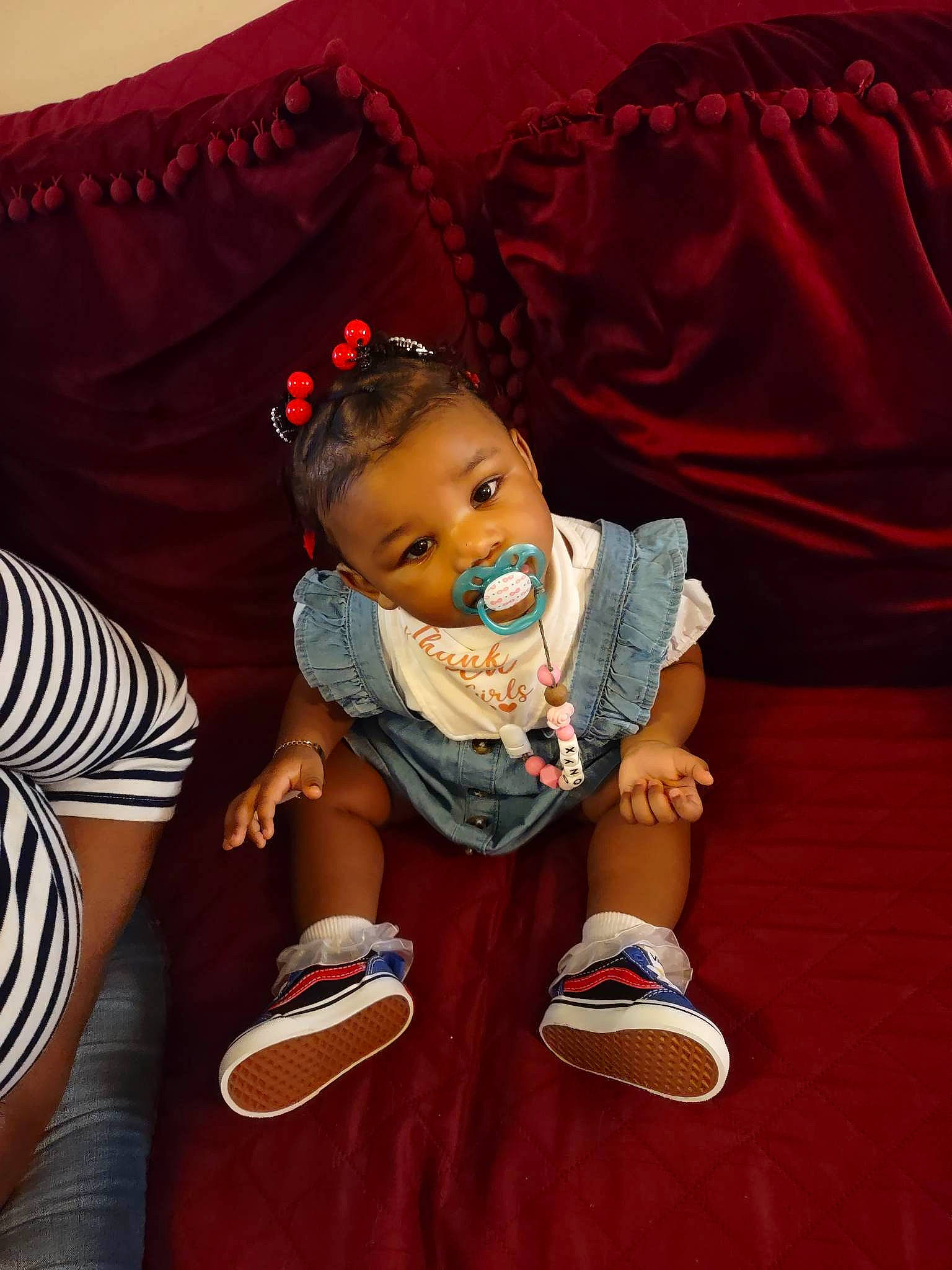 Onyx is registered to the contest to win money with this photo: baby, baby_products, baby_toddler_clothing, cheek, child, comfort, fashion_accessory, foot, happy, human_leg, lap, linens, pattern, person, sitting, sleeve, sock, thigh, toddler, white
