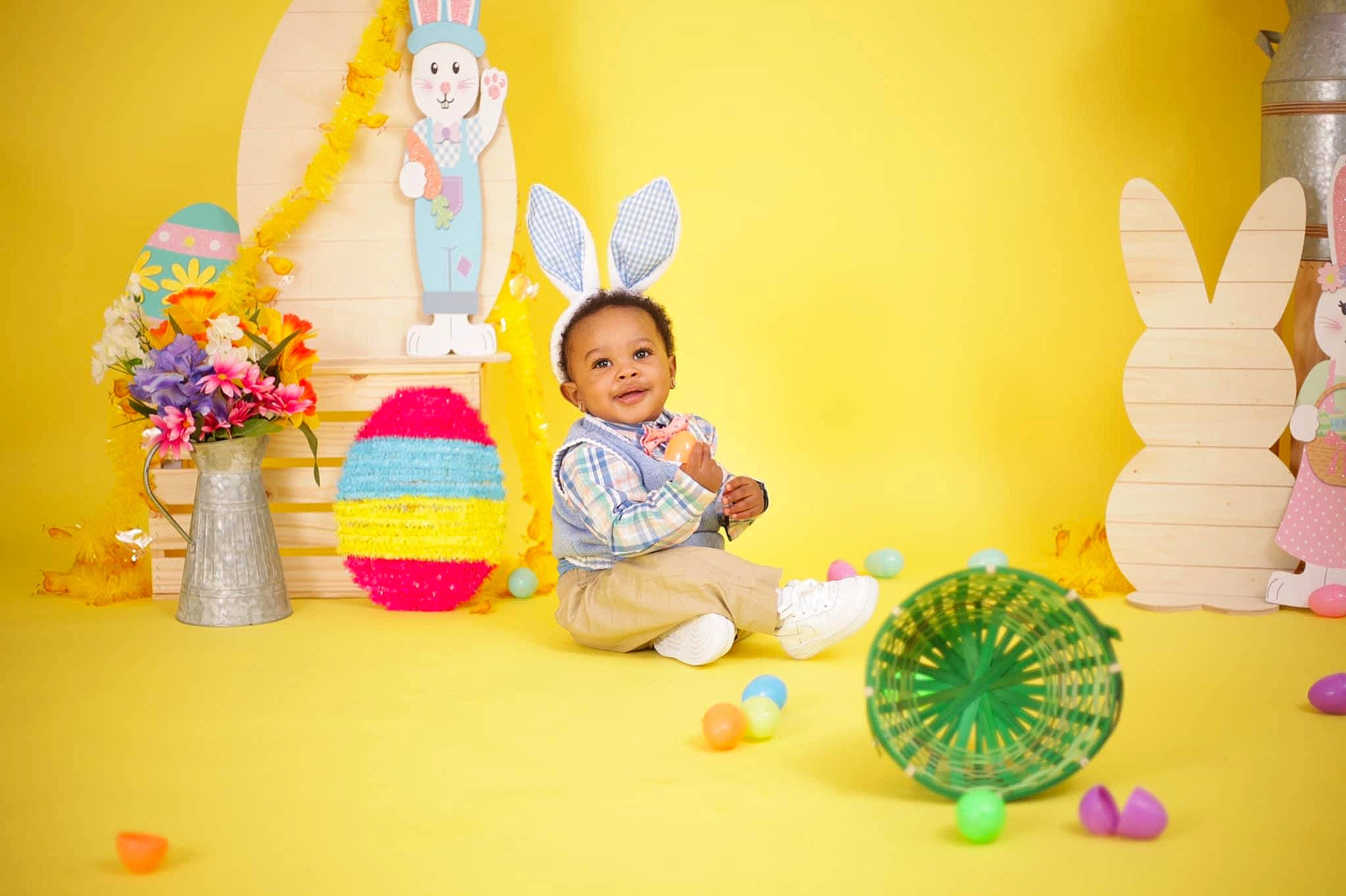 Kylan is registered to the contest to win money with this photo: animation, art, baby, baby_toys, child, event, fun, happy, leisure, party_supply, person, play, room, smile, stuffed_toy, textile, toddler, toy, visual_arts, wall_sticker