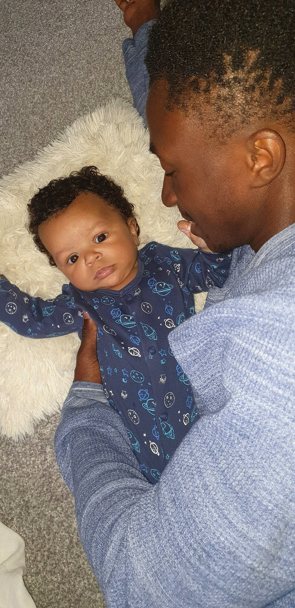 Leroy is registered to the contest to win money with this photo: baby, black_hair, cheek, child, daughter, eye, face, father, forehead, head, hug, male, nose, people, person, skin, smile, toddler