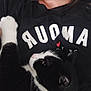 amour, animal, black_and_white, cat, closeup, comfort, cozy, cuddle, feline, fur, human, indoor, love, person, pet, relaxation, resting, shirt, snuggling, whiskers