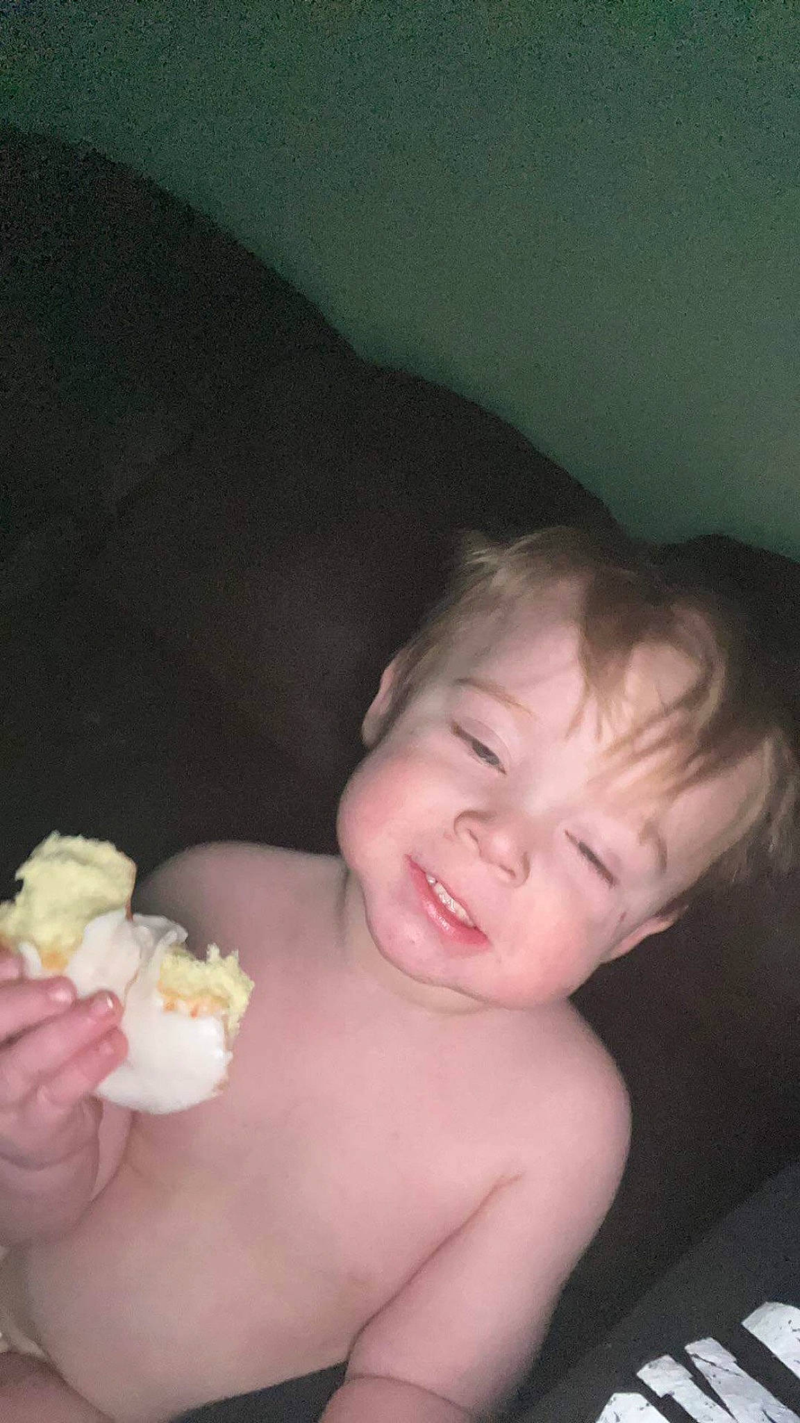 Jesse is registered to the contest to win money with this photo: arm, cheek, chest, face, finger, flash_photography, food, hand, happy, head, iris, lip, mouth, nose, person, petal, skin, smile, thumb, toddler