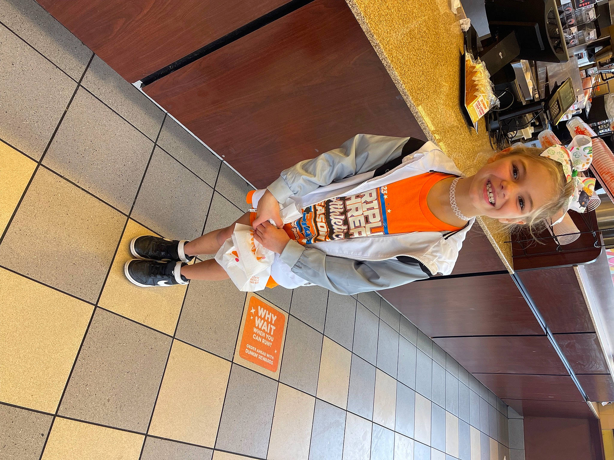 Mia joined the competition — help win amazing prizes! flooring, foot, fun, human_leg, joy, machine, orange, pattern, person, thigh, walking_shoe