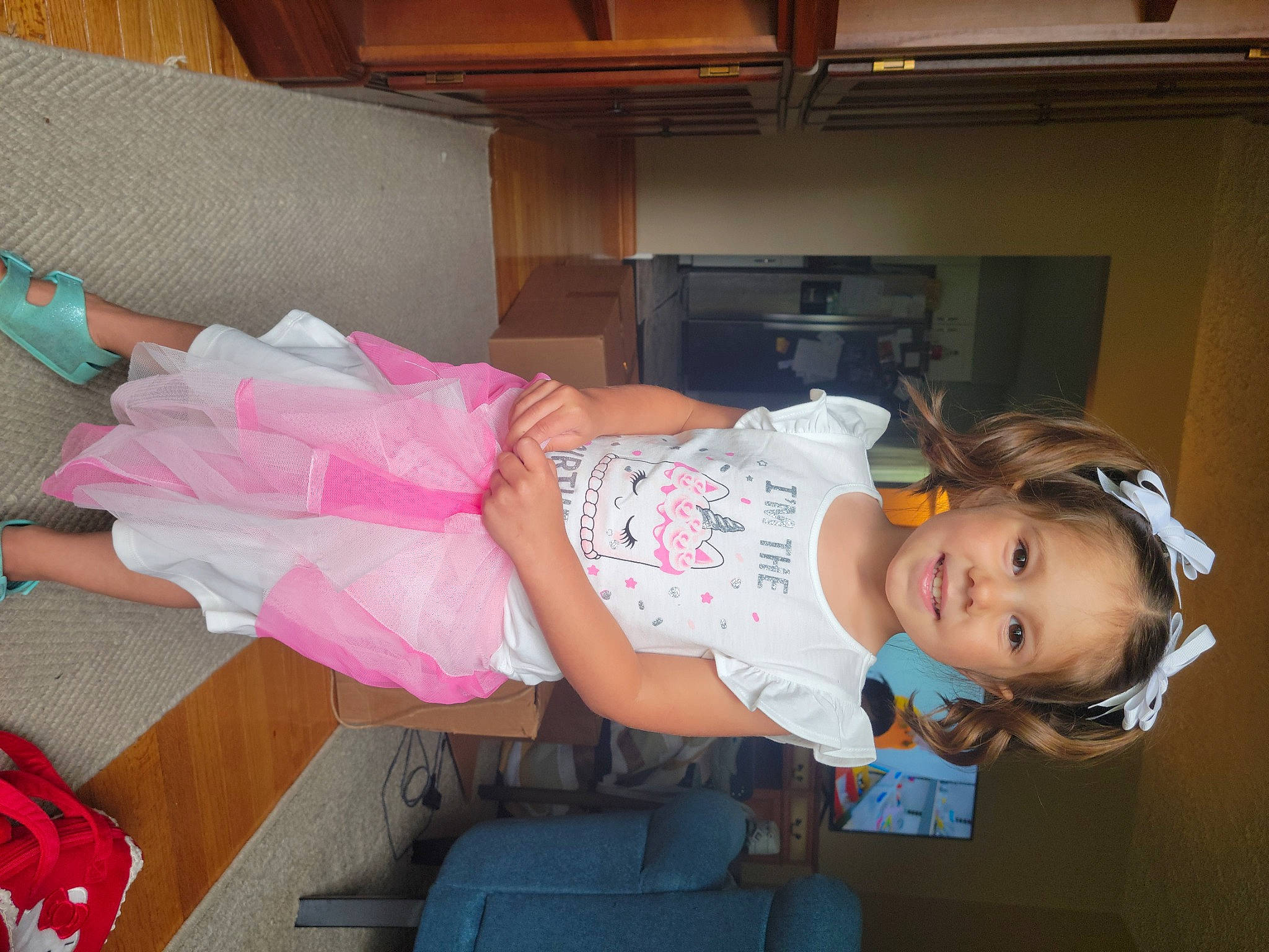 Maleah is registered to the contest to win money with this photo: baby, baby_toddler_clothing, child, comfort, fun, happy, hat, human_leg, joy, lap, luggage_and_bags, magenta, person, pink, room, smile, sock, thigh, toddler