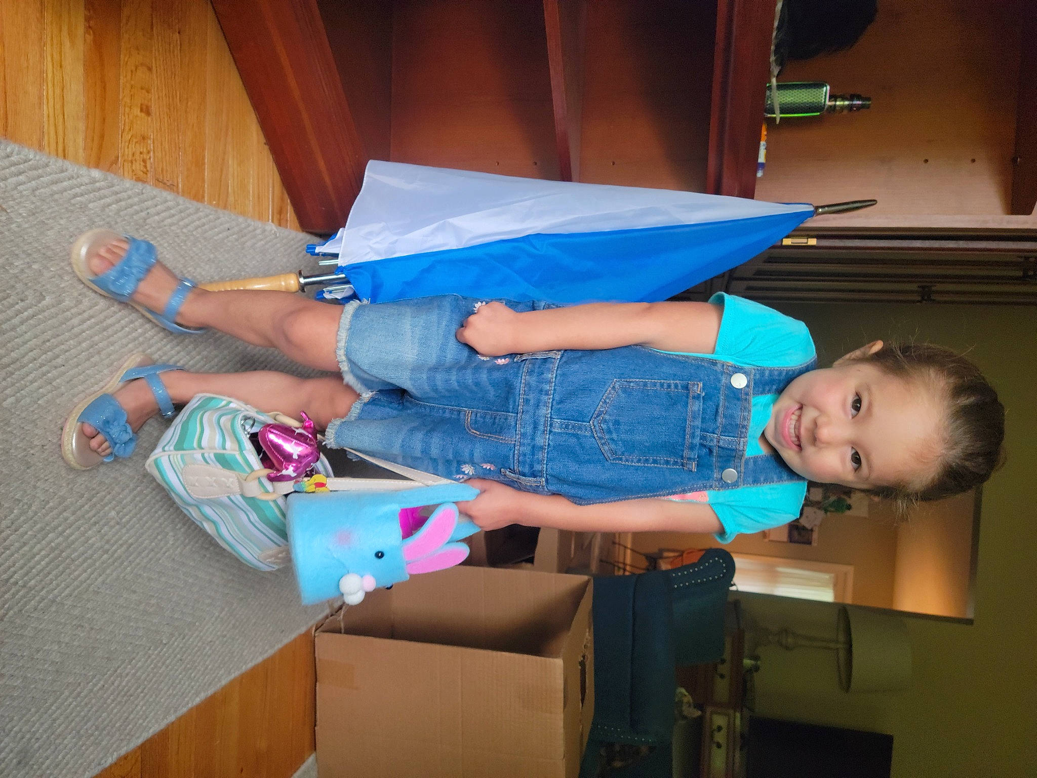 Maleah joined the competition — help win amazing prizes! box, carton, child, dress, electric_blue, flooring, foot, fun, human_leg, joy, knee, lap, person, room, sandal, shipping_box, smile, thigh, toddler