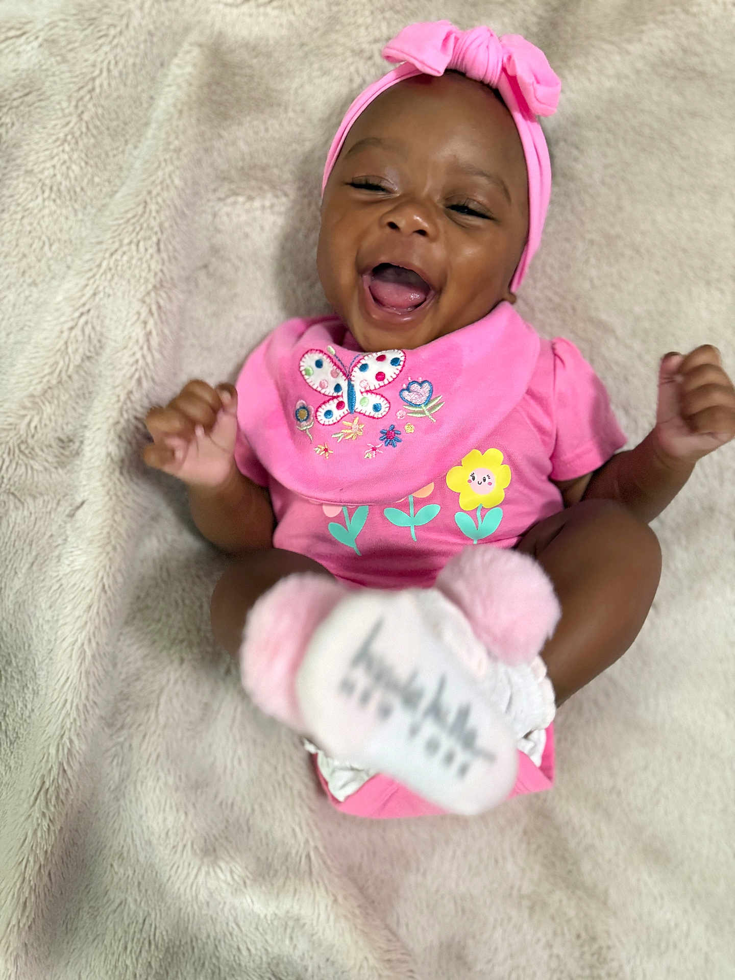 Kaydence joined the competition — help win amazing prizes! baby, infant, smiling, laughing, pink_clothing, headband, bib, soft_blanket, child, happy, cute, portrait, closeup, baby_sock, indoor, toddler, young_child, expression, joy, person