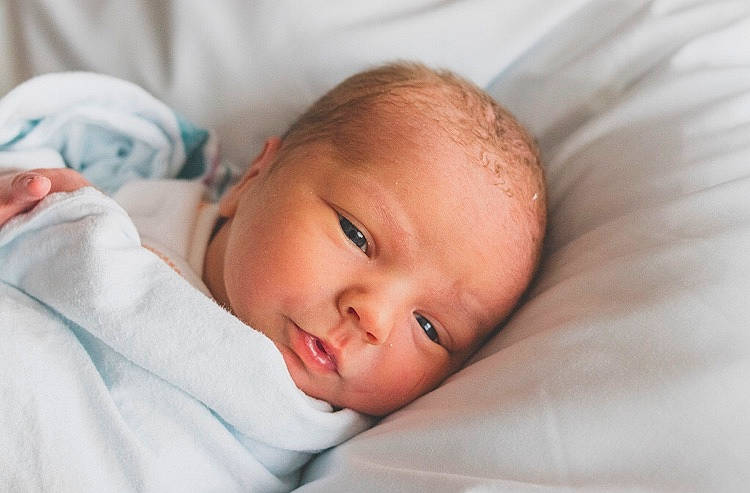 Keegan is registered to the contest to win money with this photo: baby, baby_toddler_clothing, bedtime, cheek, child, close_up, comfort, ear, event, eyelash, human_body, iris, linens, lip, nose, person, room, skin, sleep, textile