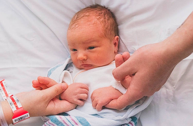 Keegan joined the competition — help win amazing prizes! baby, baby_products, baby_toddler_clothing, cheek, child, comfort, event, eye, face, finger, gesture, hand, happy, linens, nail, person, sitting, skin, stomach, thumb