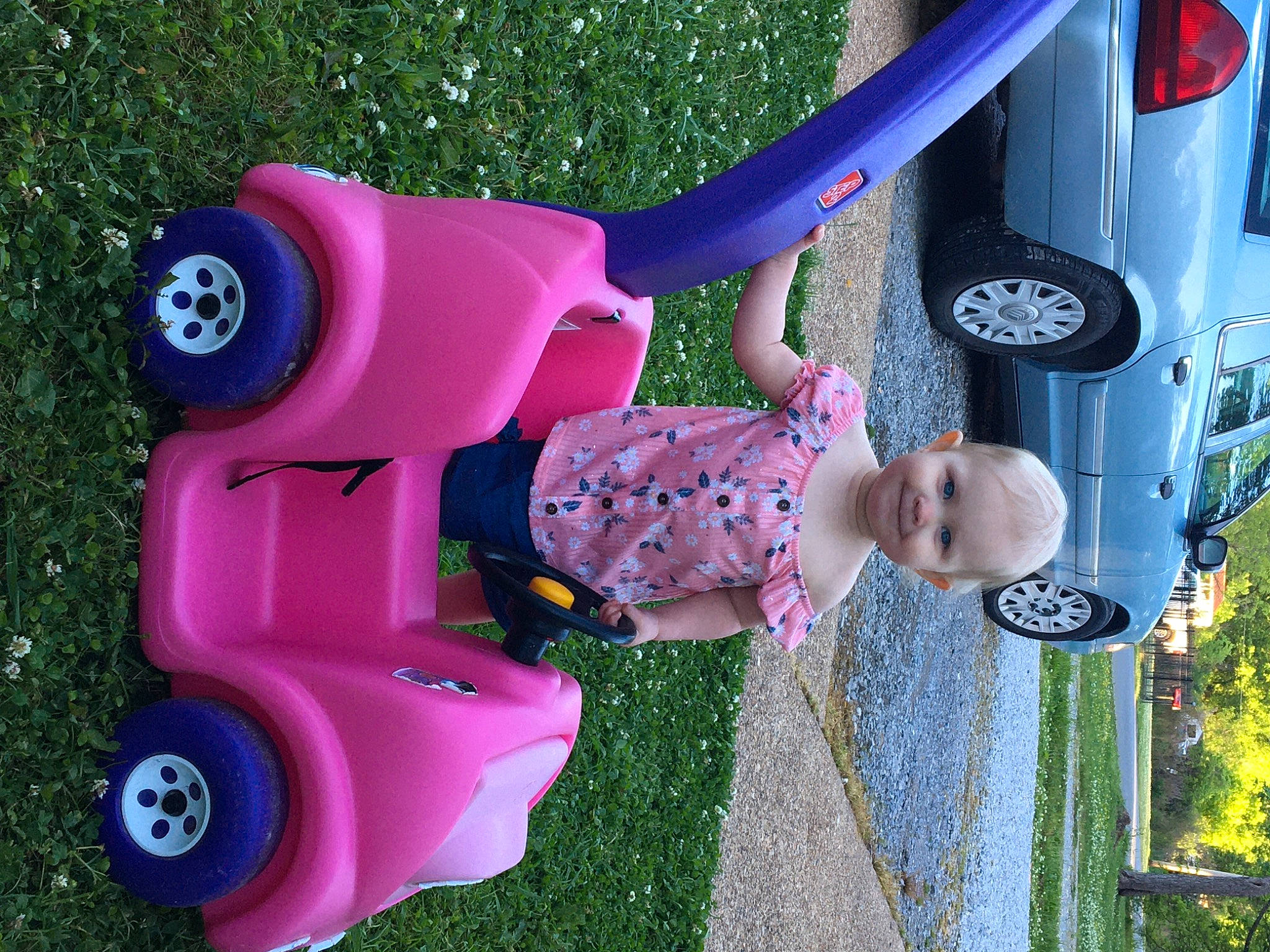 Karmyn joined the competition — help win amazing prizes! automotive_tire, car, fender, fun, grass, green, joy, leisure, motor_vehicle, person, pink, plant, product, purple, red, tire, toddler, vehicle, vehicle_door, vertebrate