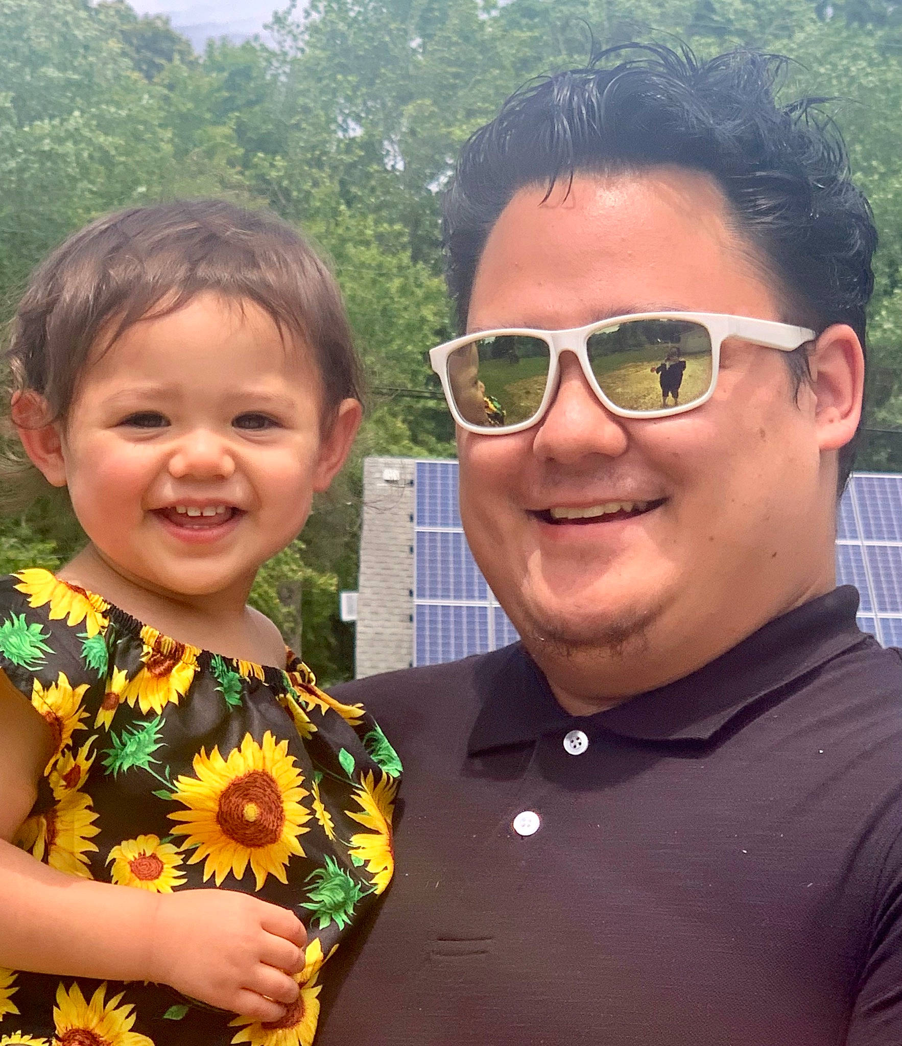 Aria is registered to the contest to win money with this photo: chin, eyewear, face, facial_expression, forehead, gesture, glasses, goggles, hair, hairstyle, happy, head, joy, nose, people_in_nature, person, plant, smile, sunglasses, tree