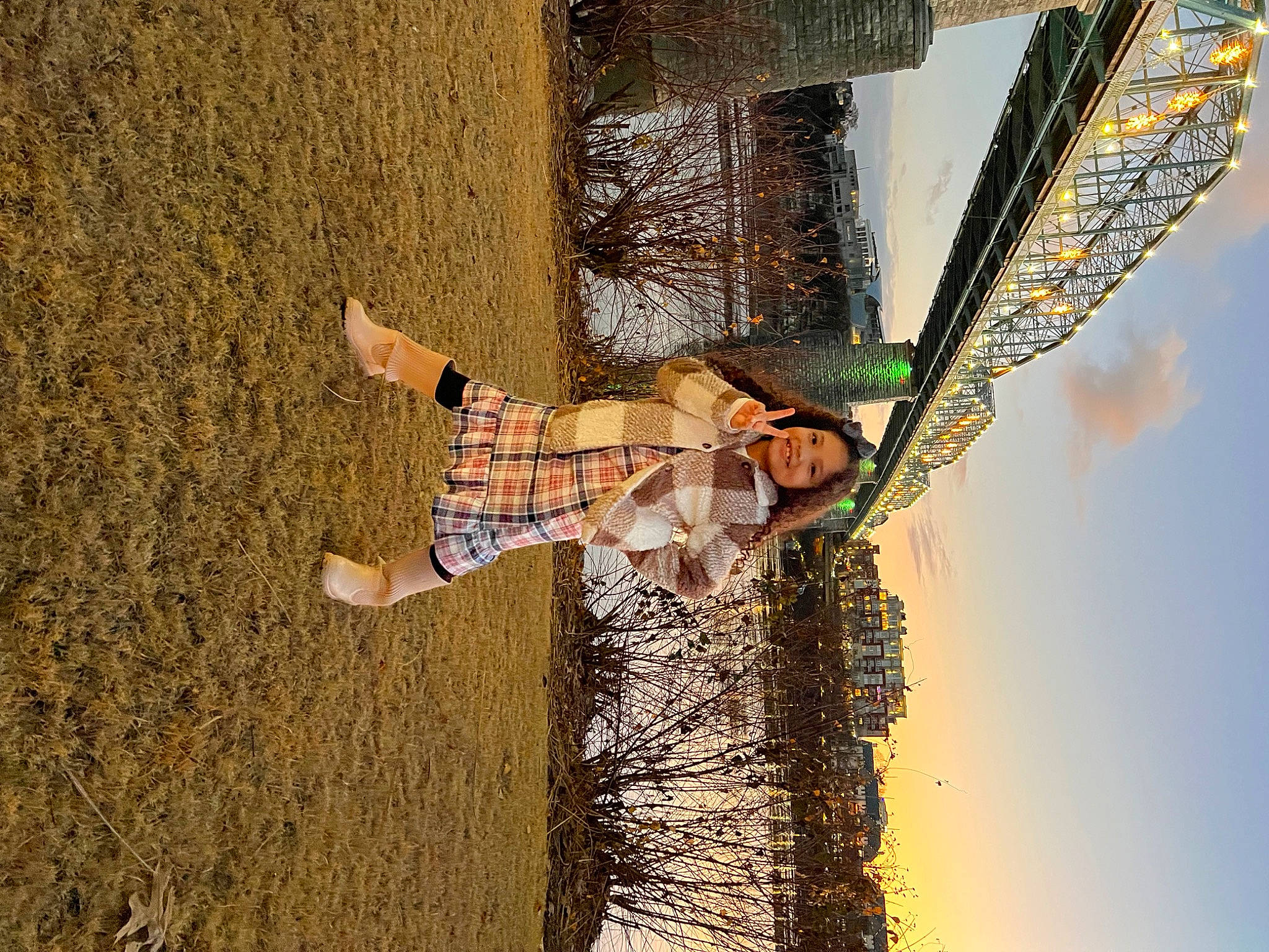 Miya is registered to the contest to win money with this photo: building, facade, fun, gesture, happy, joy, landscape, leisure, people_in_nature, person, plant, reflection, shadow, sky, soil, tints_and_shades, tree, wood