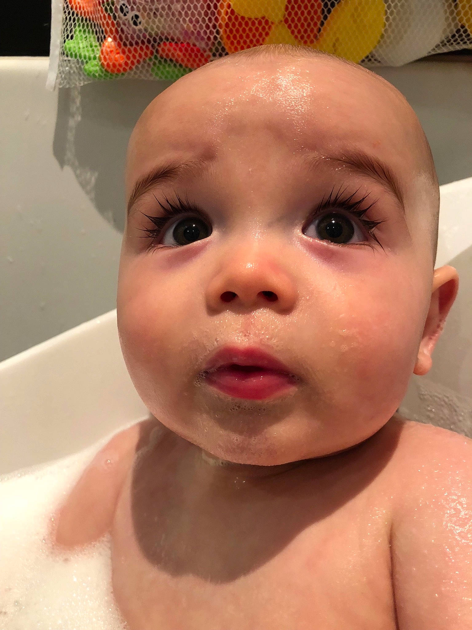 Indigo is registered to the contest to win money with this photo: baby, baby_bathing, baby_making_funny_faces, bathing, cheek, child, eyebrow, eyelash, face, facial_expression, forehead, head, lip, mouth, nose, person, skin, surprise, toddler