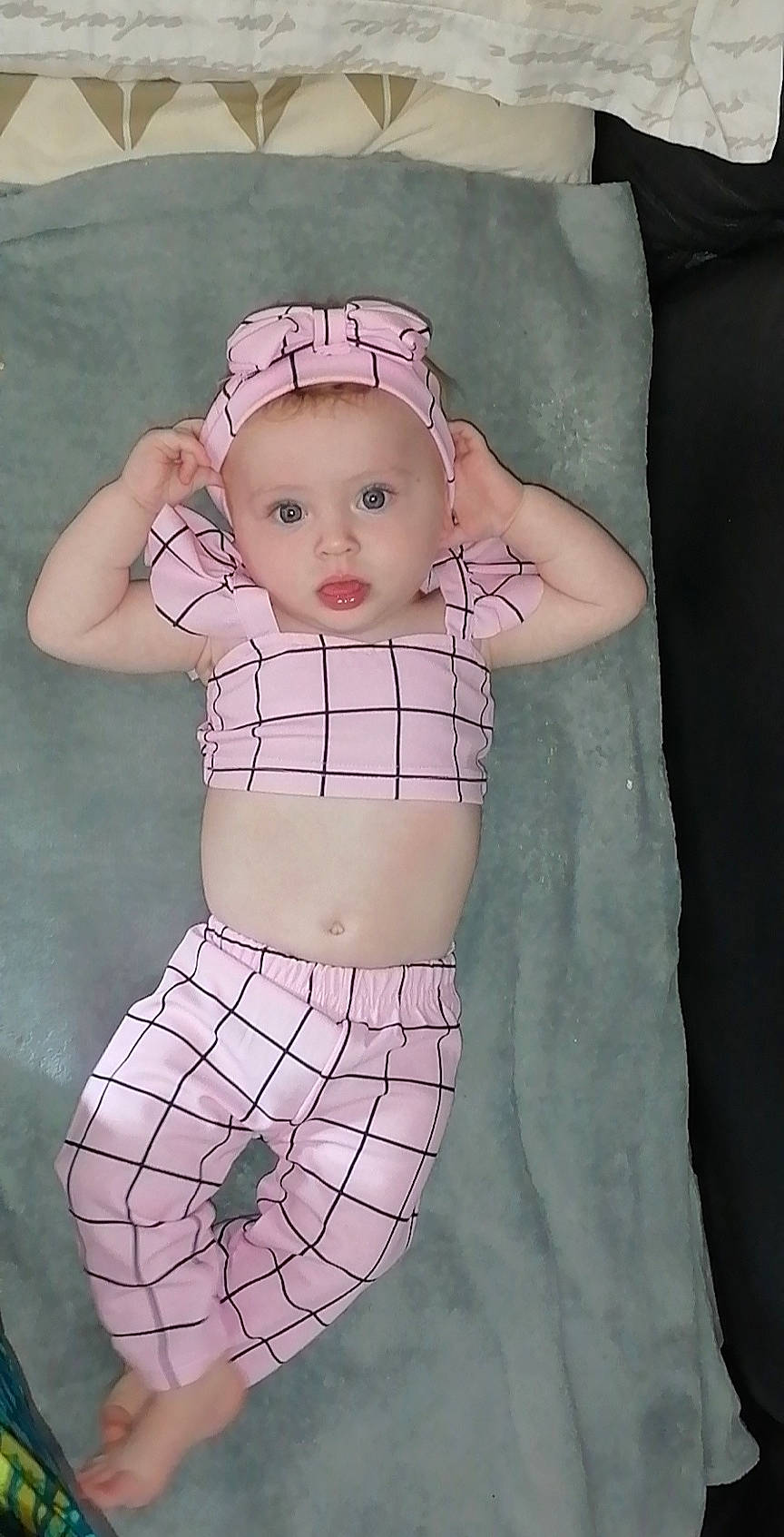 Maddie a rejoint le concours — aidez-le/la à gagner de superbes lots ! abdomen, arm, baby, baby_toddler_clothing, cheek, chest, doll, navel, pattern, person, pink, sleeve, stomach, textile, thigh, toddler, toy, trunk, undergarment, waist