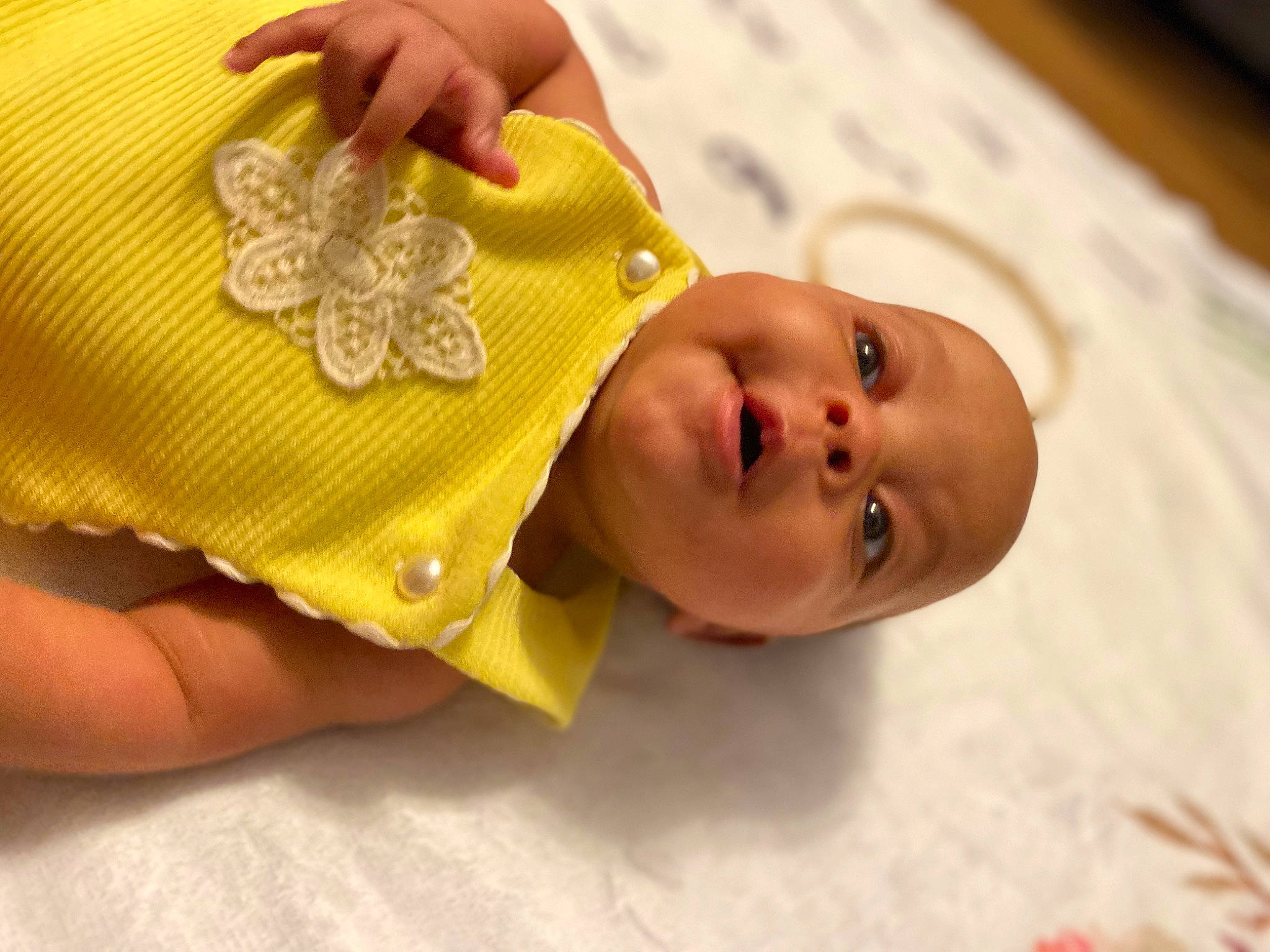 Annalise joined the competition — help win amazing prizes! baby, baby_products, baby_safety, baby_toddler_clothing, cheek, child, comfort, facial_expression, fashion_accessory, finger, gesture, happy, headgear, pattern, person, skin, sleeve, thumb, toddler, wood
