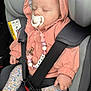 baby, beaded_chain, car_interior, car_seat, child, clip, cute, floral_leggings, headwear, hood, infant, pacifier, peaceful, person, pink_jacket, safety, seatbelt, sleeping, socks, transportation