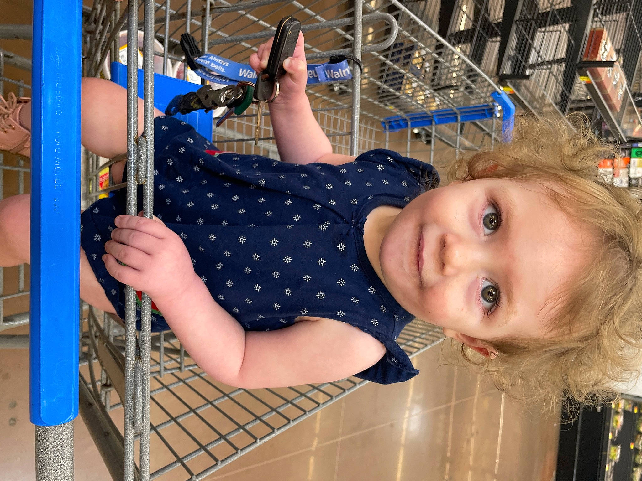 Meredith is registered to the contest to win money with this photo: blond, child, chin, electric_blue, engineering, fun, happy, human_leg, joy, leisure, pattern, person, recreation, smile, t_shirt, thigh, toddler, vacation