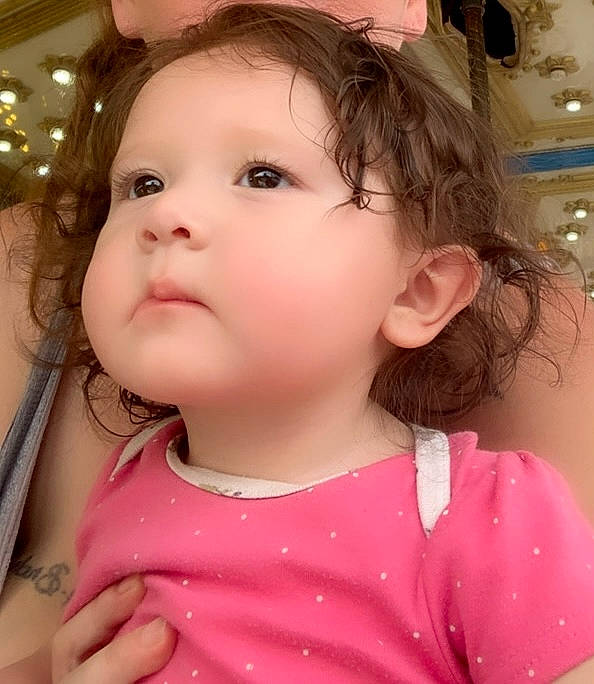 Autumn is registered to the contest to win money with this photo: baby_toddler_clothing, cheek, chin, ear, eye, eyebrow, eyelash, facial_expression, hair, hairstyle, happy, iris, lip, mouth, neck, nose, person, pink, skin, sleeve