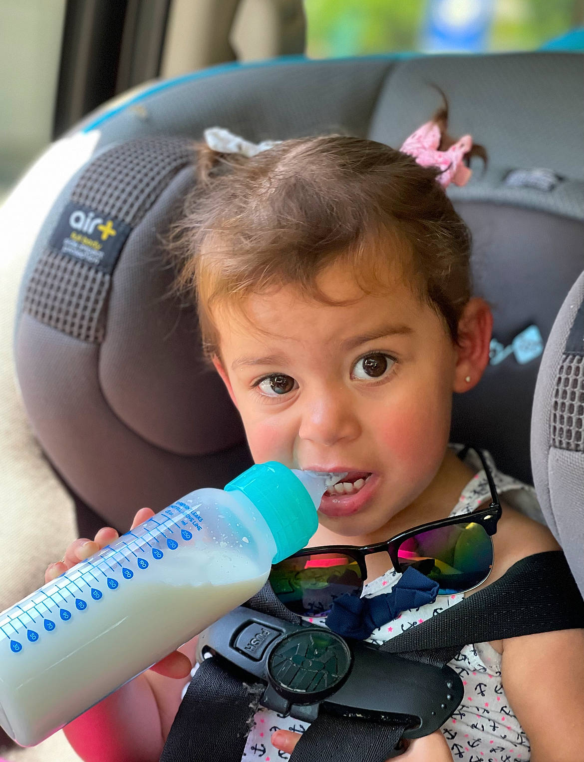 Ariella joined the competition — help win amazing prizes! auto_part, automotive_design, baby_products, baby_toddler_clothing, beauty, child, drinkware, electric_blue, fun, happy, nail, person, photograph, plastic_bottle, product, skin, smile, snapshot, steering_wheel, surprise