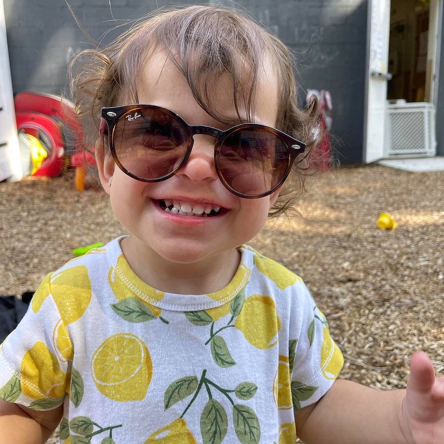Ariella joined the competition — help win amazing prizes! baby_toddler_clothing, cheek, chin, cool, eyewear, finger, glasses, goggles, happy, joy, lip, mouth, nose, person, photograph, skin, sleeve, smile, sunglasses, vision_care