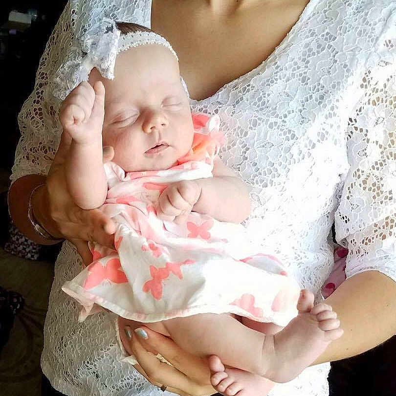 Tayler is registered to the contest to win money with this photo: abdomen, child, daughter, girl, hair_accessory, headpiece, infant, mother, photograph, pink, product, skin, smile, textile, toddler, trunk