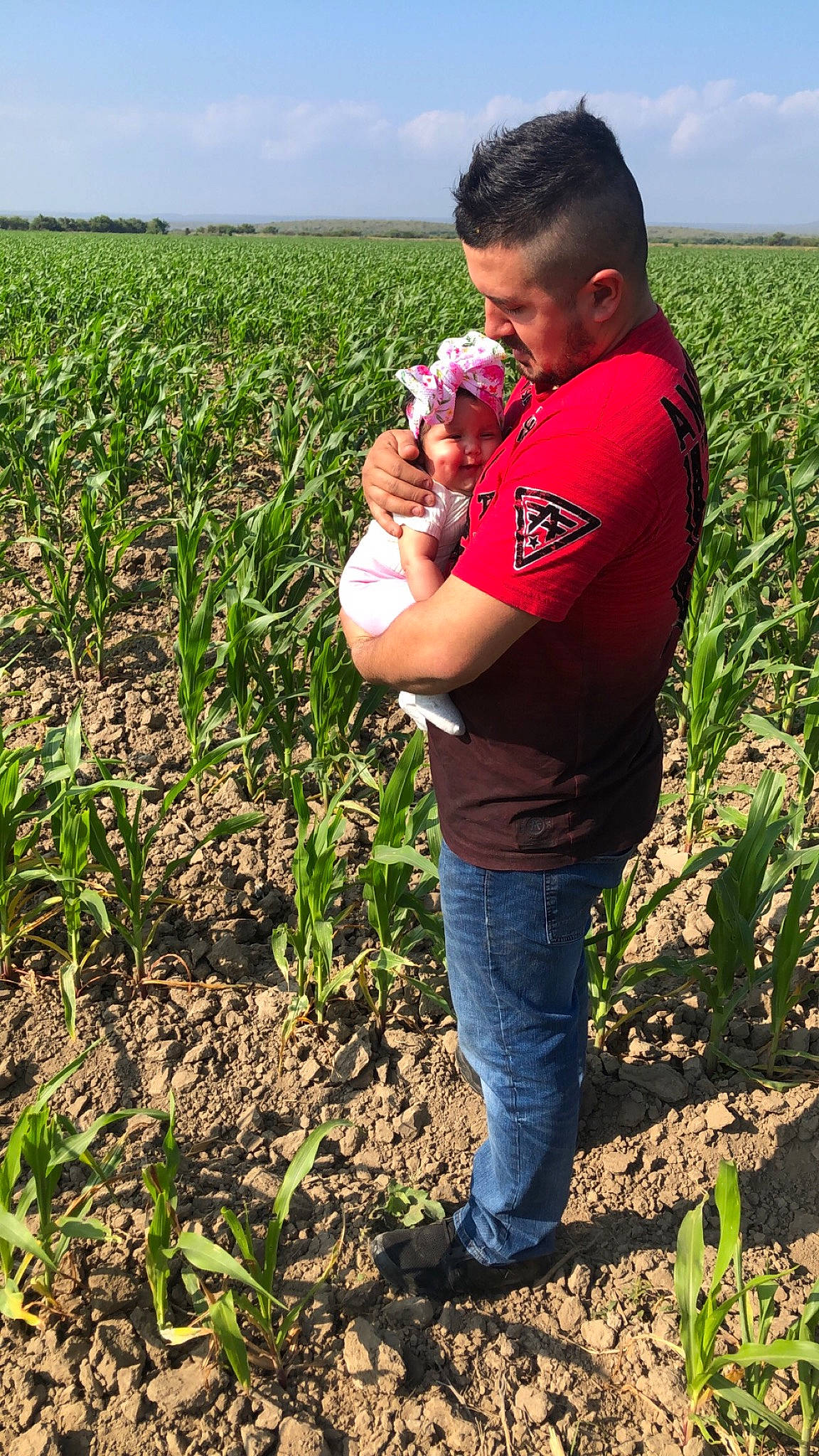 Alaina joined the competition — help win amazing prizes! agriculture, apple, cloud, farmer, farmworker, field, food, fruit, gesture, grass, grassland, happy, headwear, jeans, natural_foods, people_in_nature, person, plant, plantation, sky