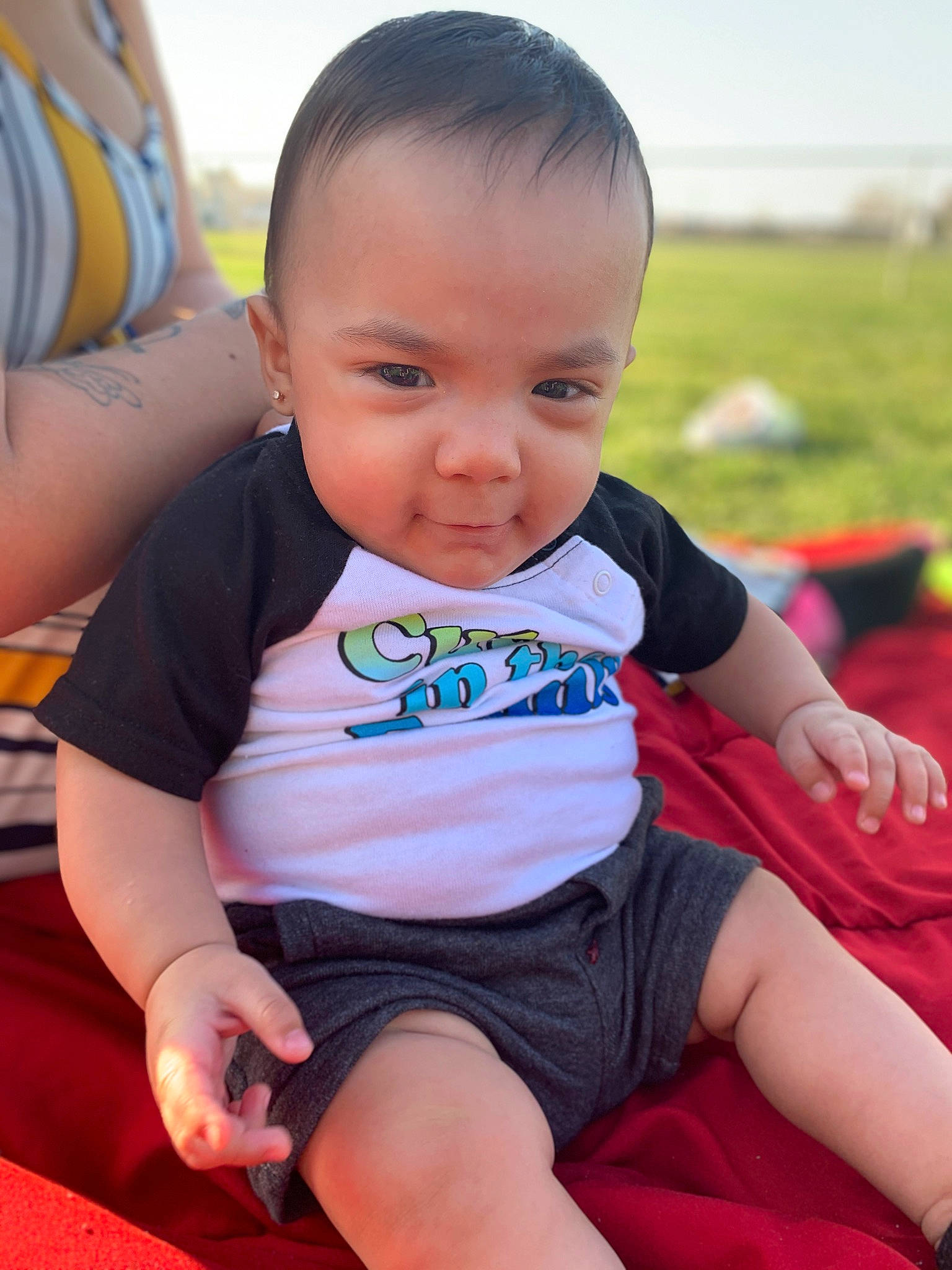 Yeikiel is registered to the contest to win money with this photo: baby, baby_toddler_clothing, cheek, child, chin, facial_expression, finger, fun, grass, happy, head, leisure, person, pink, skin, sky, smile, standing, thigh, toddler