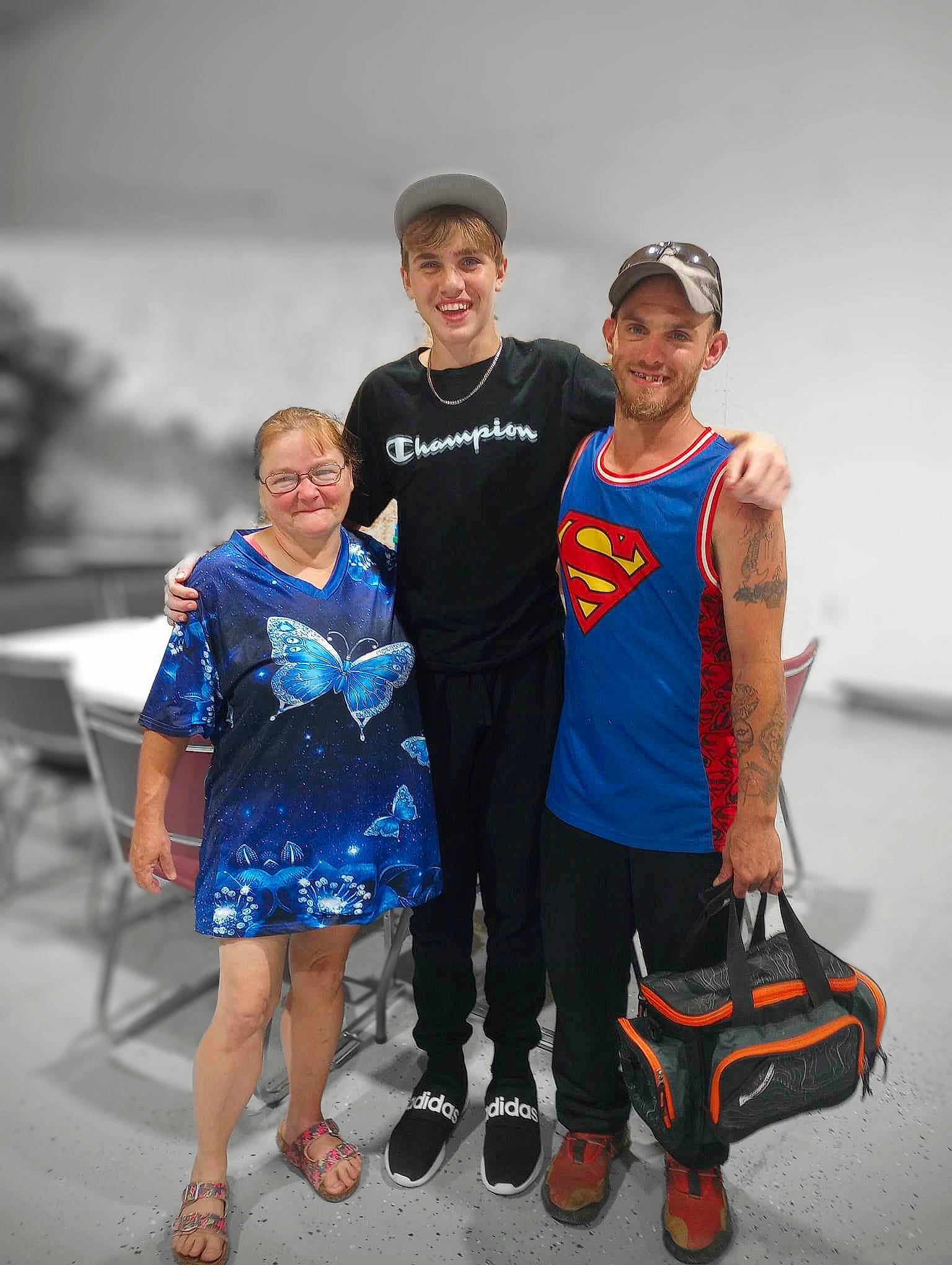 William is registered to the contest to win money with this photo: boot, chair, competition, competition_event, electric_blue, event, fashion_design, fun, happy, headwear, joy, leisure, person, personal_protective_equipment, recreation, sandal, shoe, smile, sneakers, sportswear